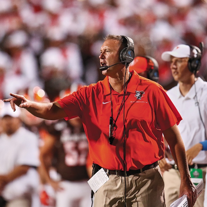 Scot Loeffler shouting from sidelines