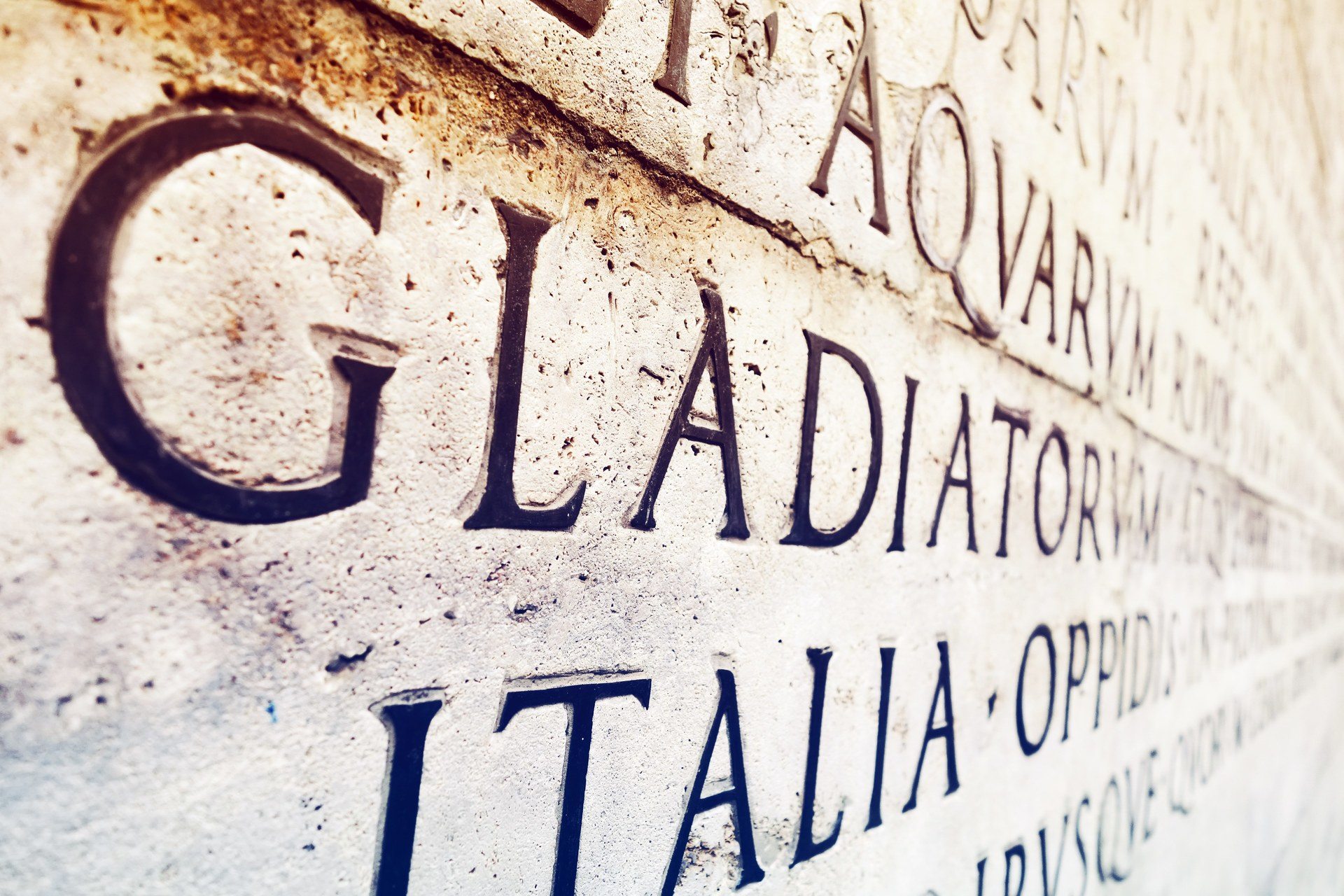 Latin inscription on  wall in Rome, Italy