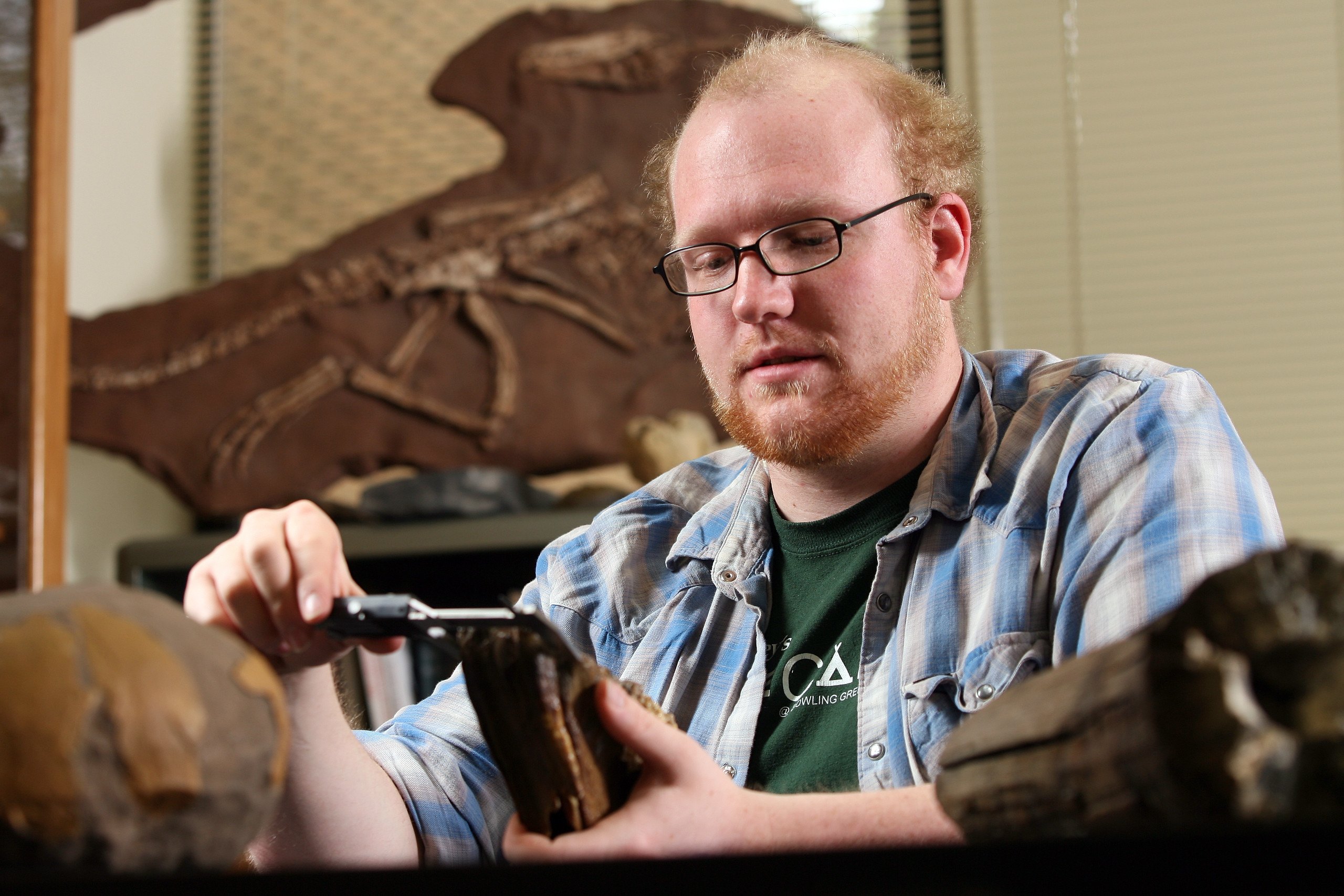 BGSU geology paleobiology students gather and measure rock samples to trace the path of life through the fossil record.