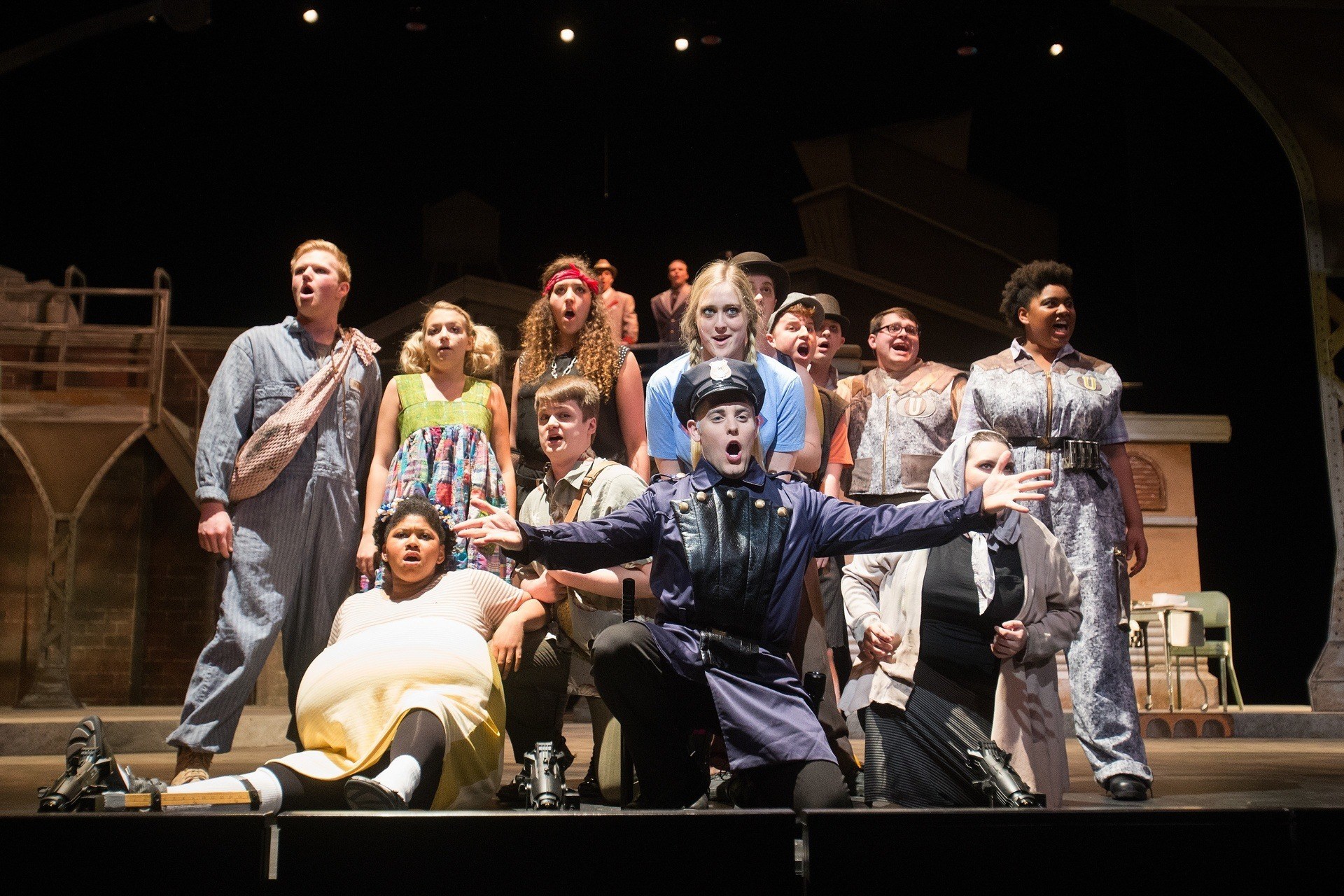 student actors performing on theatre stage