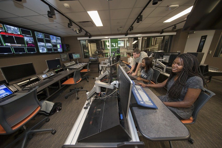 Four BSGU media production and studies students work at the production consoles of one of the Kuhlin Center’s state-of-the-art TV production facilities.