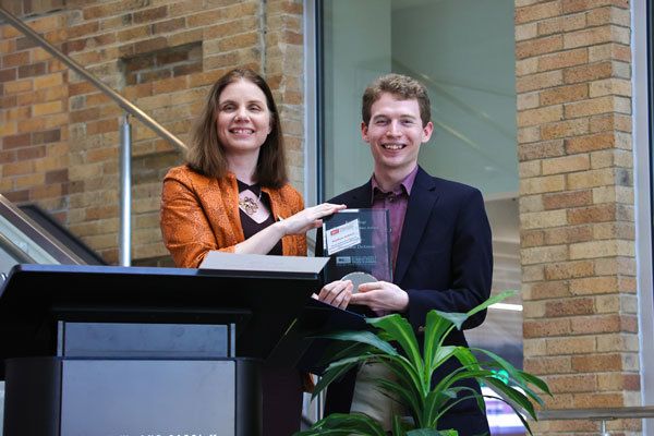 Jennifer Percival presents Graduating Senior Matt DeAmon with the Karl E. Vogt Outstanding Senior Award