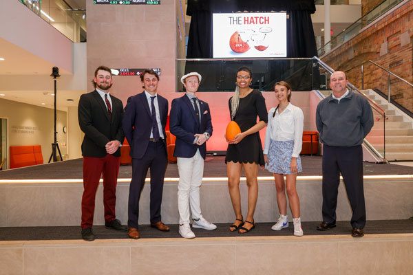 The Hatch 2023 posterboard presenters group photo in the Maurer Center on BGSU's campus.