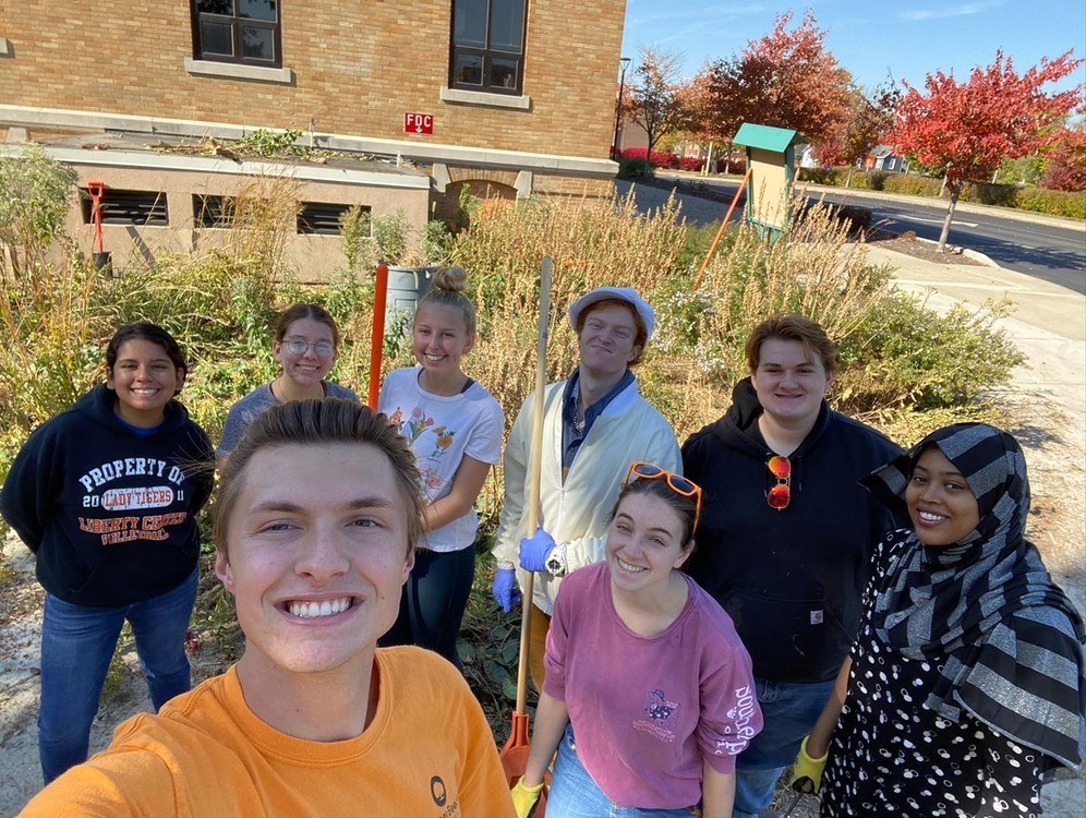 EAG cleaning the local prairie garden on BGSU campus