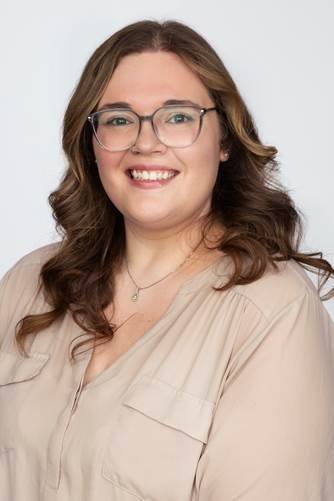 A headshot of Jennifer Stuart smiling