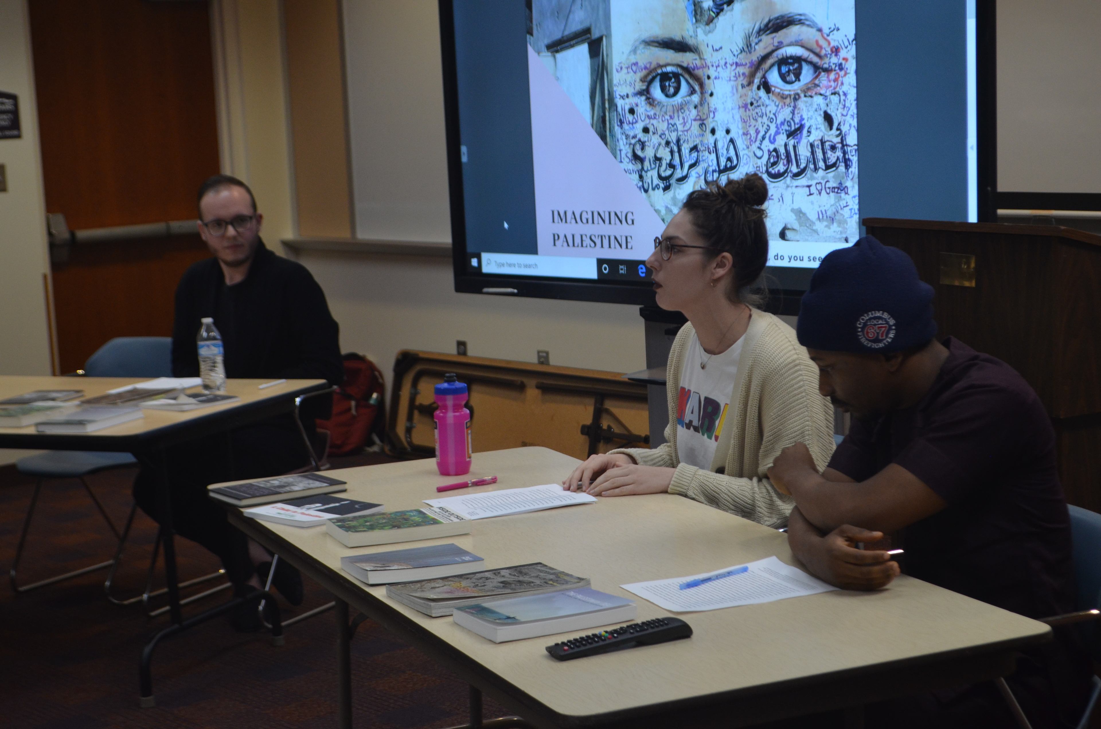 Harry Olafsen, Emily Edwards, and Michael Oshindoro Presenting