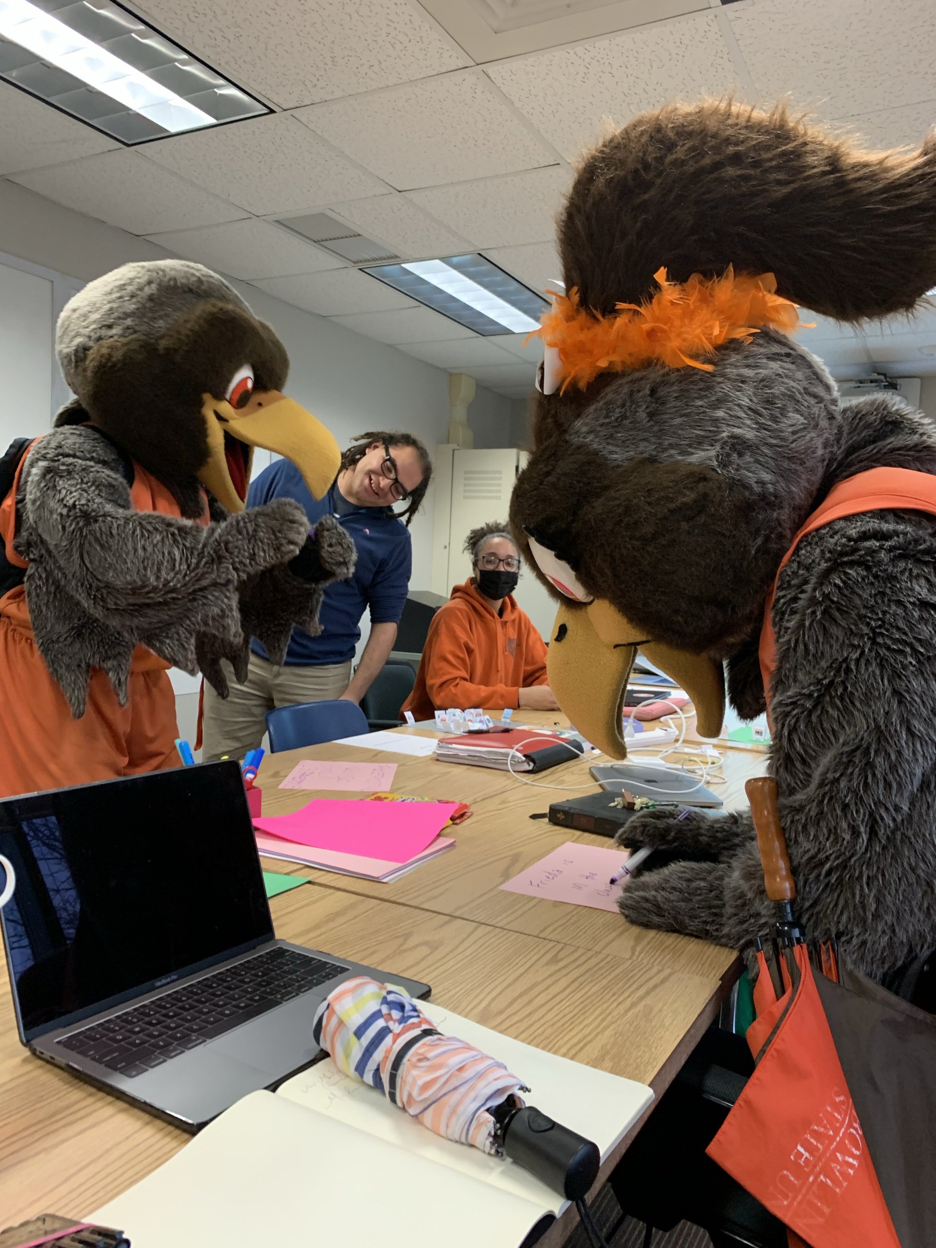 Students look on as Freddie and Frieda participate in an ESOL Methods class