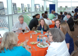 Faculty and graduate students at the welcome dinner in BGSU's Sebo Athletic Center.