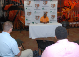 Coach Babers begins the mock press conference for Boot Camp participants.
