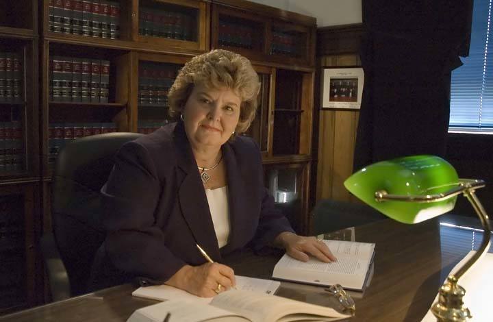 PHOTO-Montgomery-seated-at-desk