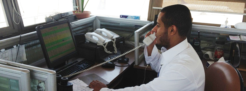 photo of student working behind a computer