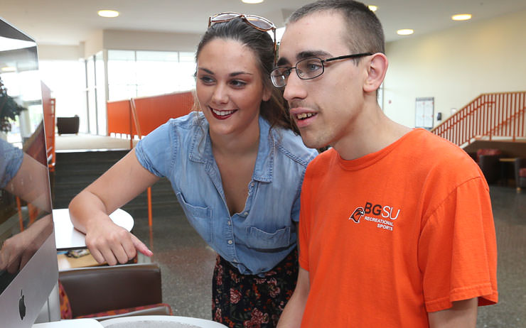 Teacher working with a student