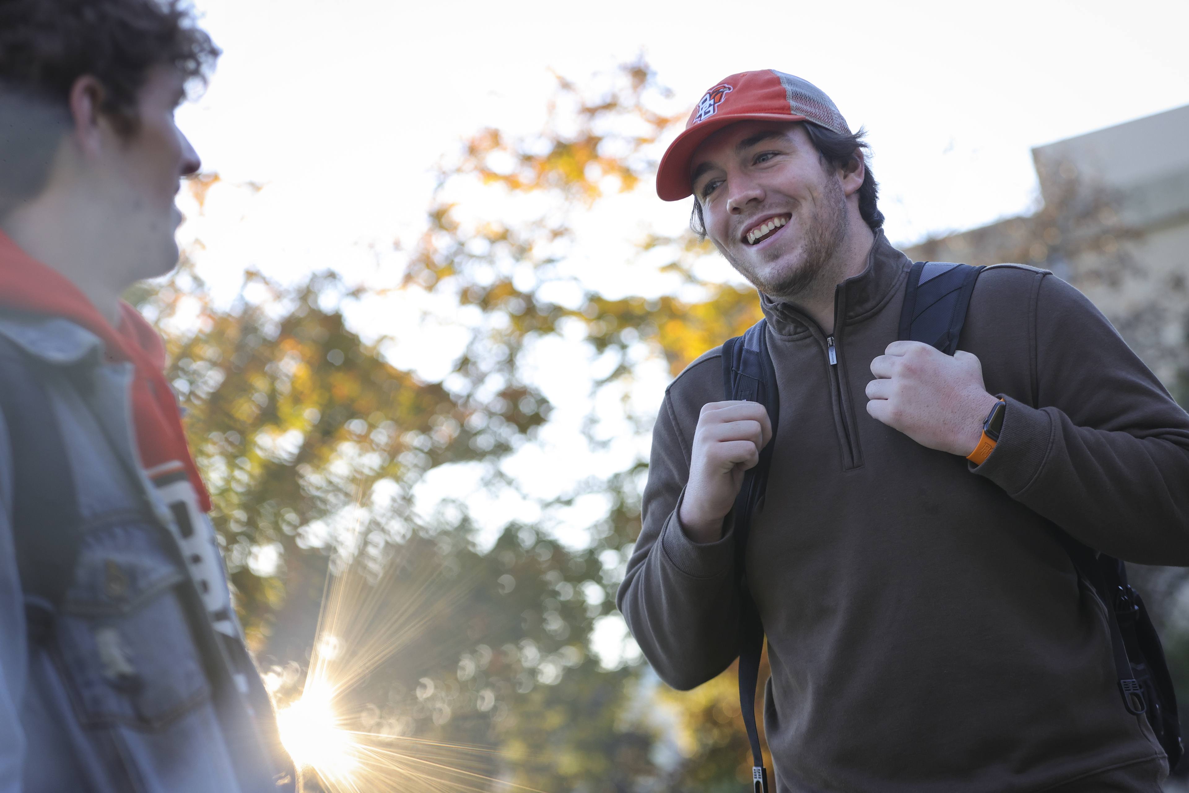 students talking outside