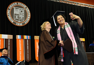 A selfie with President Mary Ellen Mazey at Commencement.