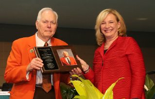 Kermit Stroh, who earned an honorary doctorate from Bowling Green State University in 2002 and was named a BGSU honorary alumnus in 2003, was honored with a Champion of Life award at the Mayor's Luncheon Tuesday prior to the GoDaddy Bowl.