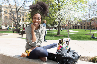 A spring day brings students outside of the Bowen-Thompson Student Union to study.