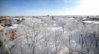 A birds-eye view of a wintry campus scene.