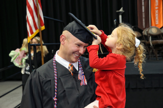Derrick Loy,  a 30-year-old who is in his 11th year of active duty service in the U.S. Air Force, visited the BGSU campus for the first time to attend his commencement ceremony.