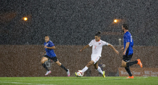 Senior Ryan James battles for a win in the torrential downpour at Cochrane Field. A total of eight Bowling Green State University men's soccer student-athletes were named to the Academic All-Mid-American Conference Team.