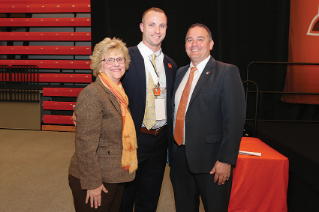 Inductee Nolan Reimold with Mary Ellen Mazey, Ph.D., President of BGSU, and Bob Moosbrugger ‘94, Director of Athletics