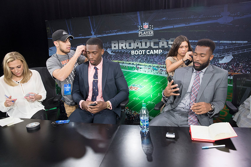 Students-working-with-NFL-players-at-broadcast-boot-camp