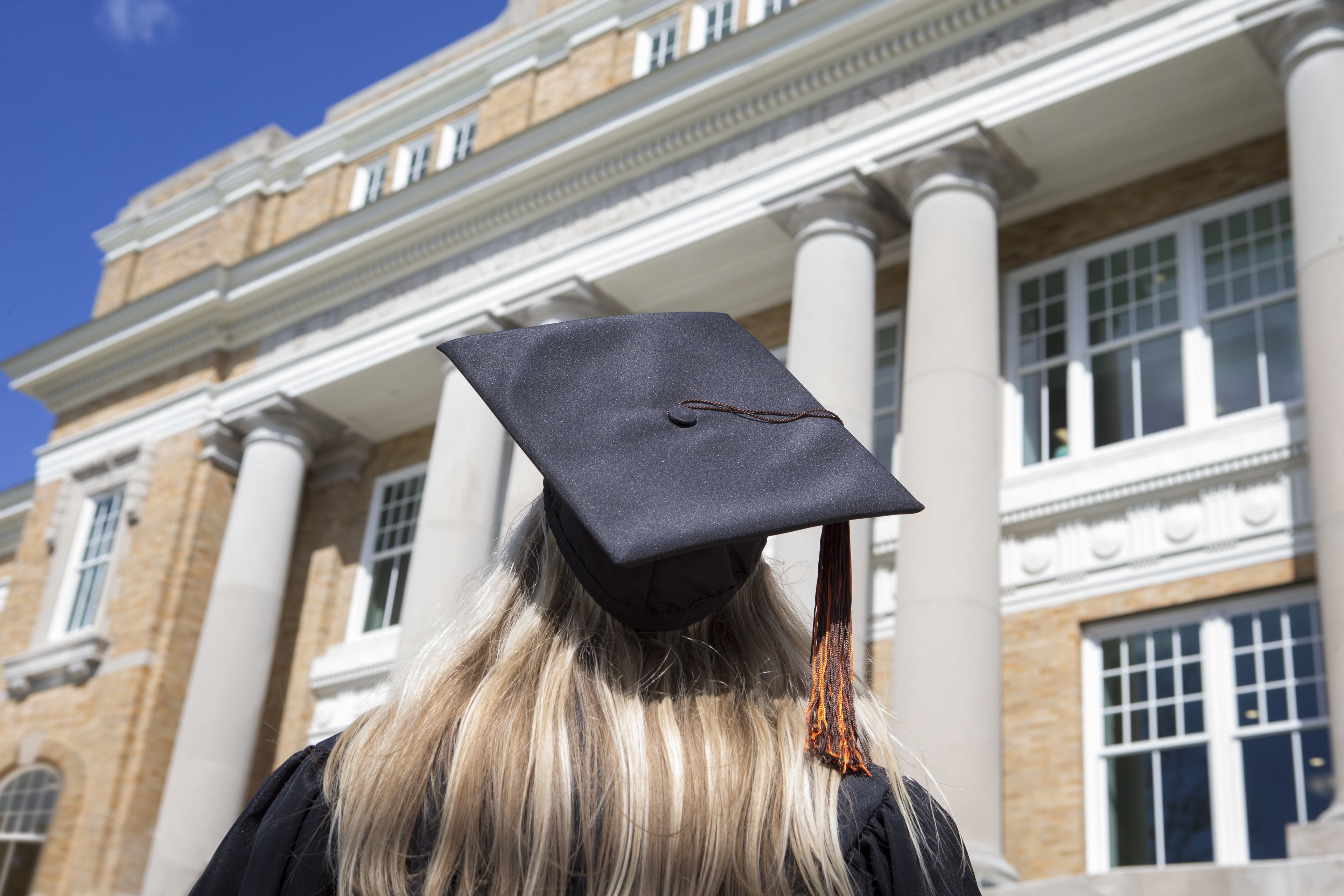 student wearing graduation cap