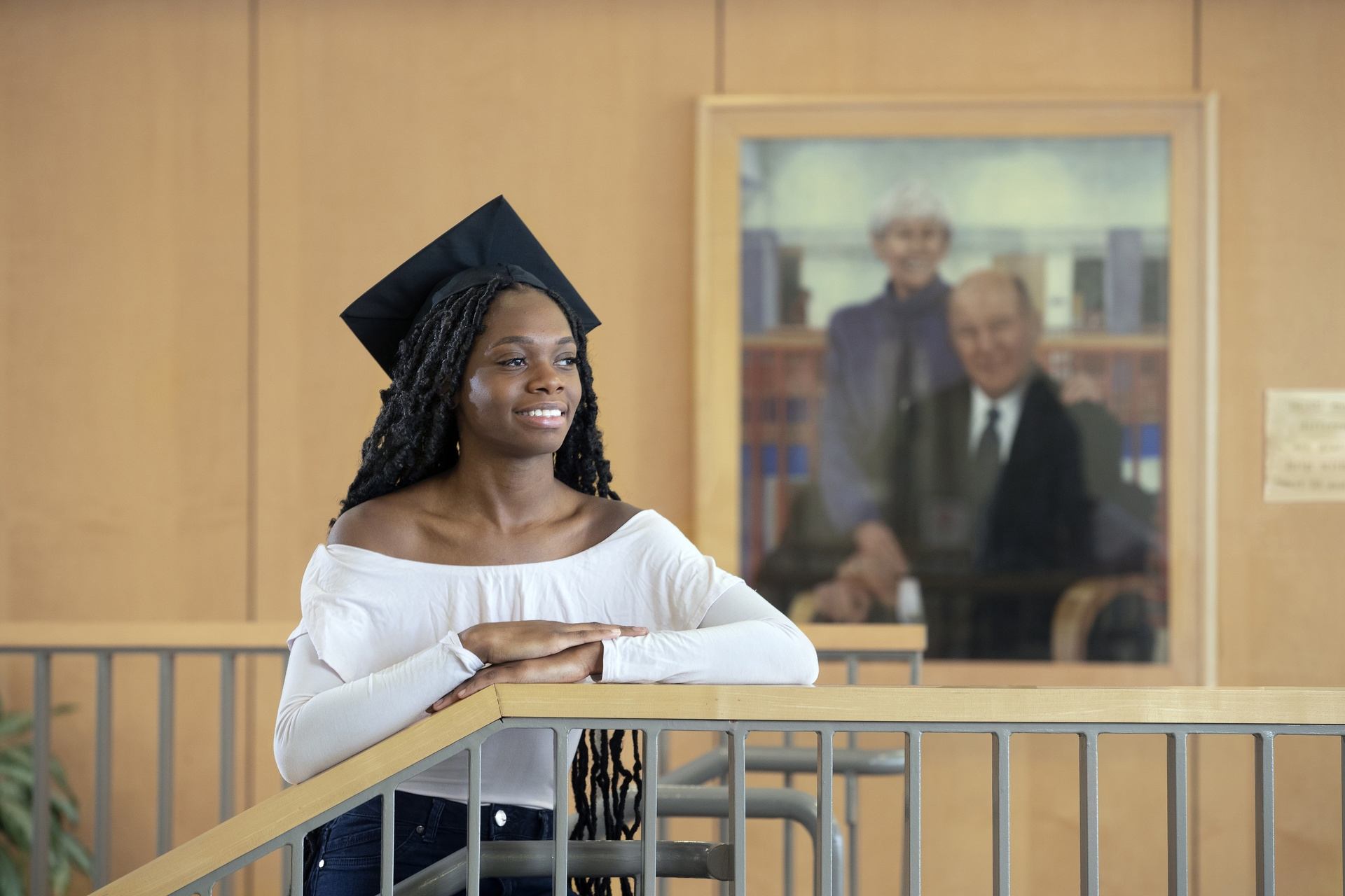 A BGSU graduate student inside on our Ohio campus wearing a mortarboard, it’s easy to apply to your BGSU masters, certificate or doctorate program now.