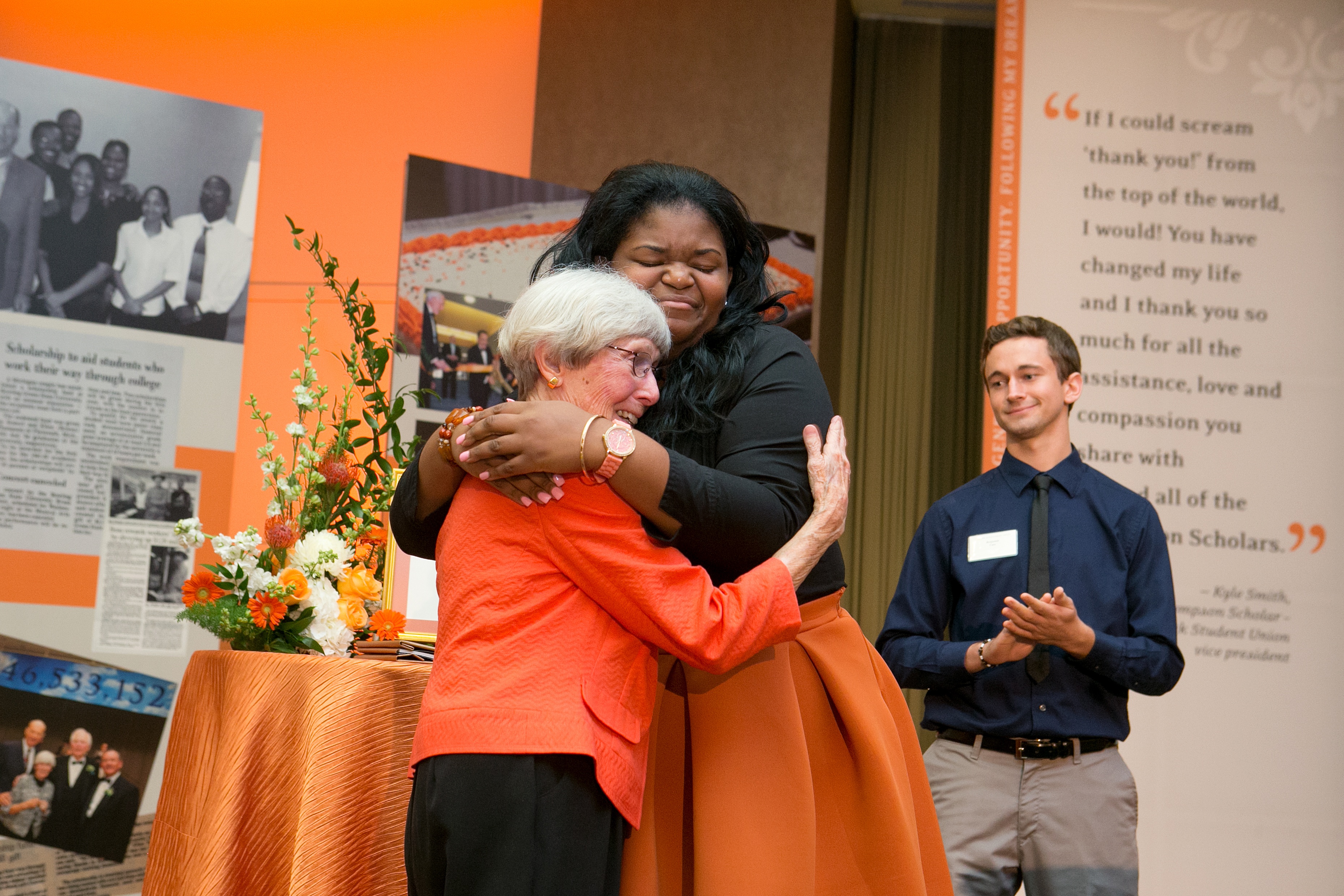 Robert and Ellen (Bowen) Thompson interacting with some of their scholarship recipients