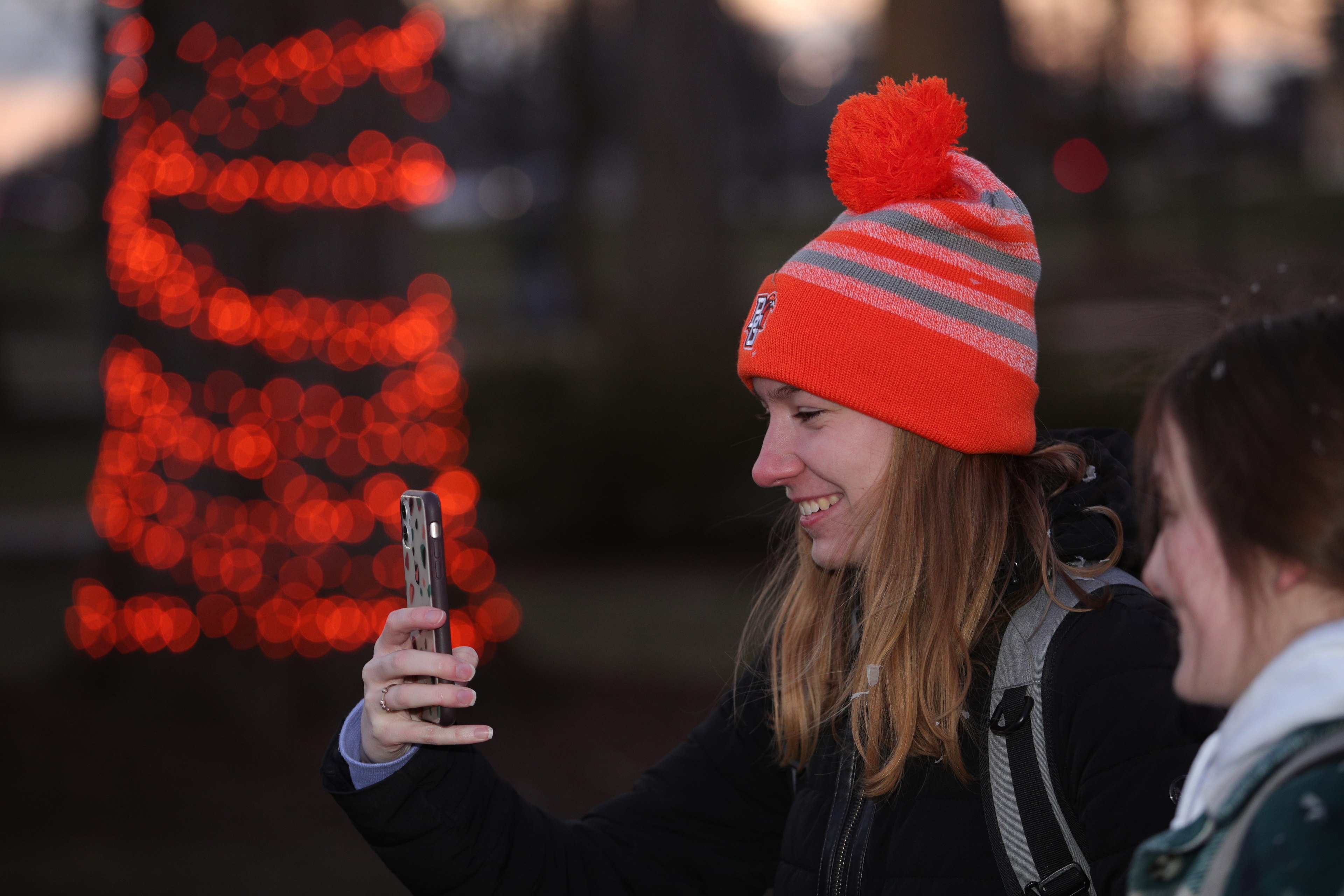 Student taking a picture at Winter Wonderland 2022