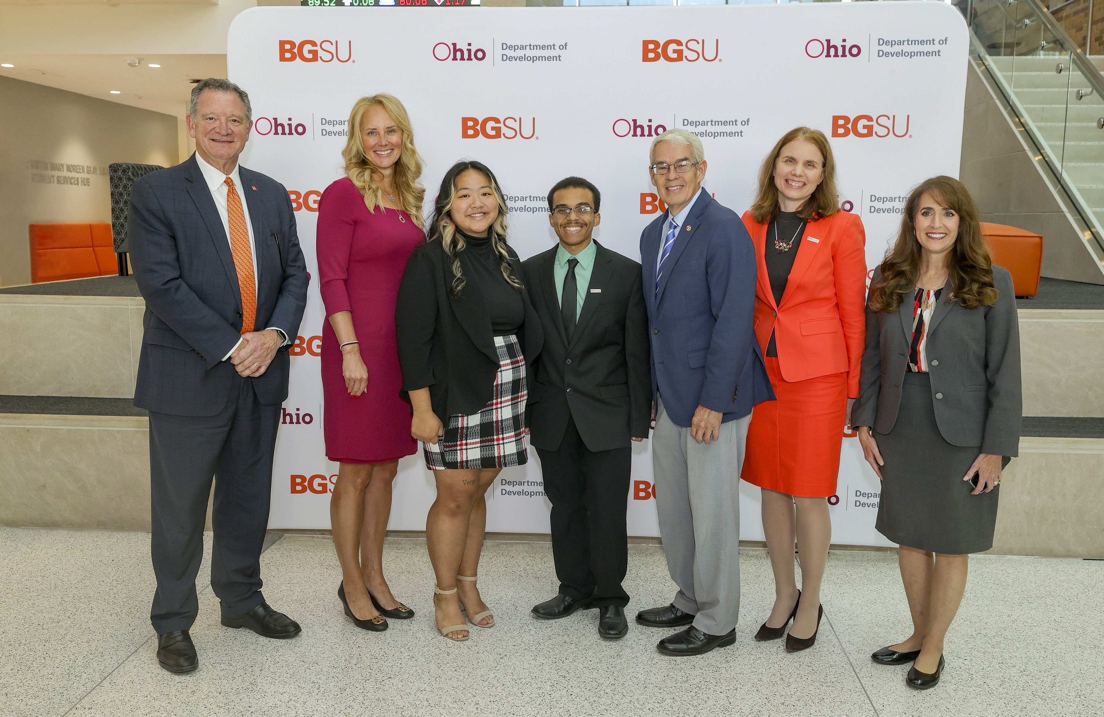 BGSU President Rodney K. Rogers, Schmidthorst College of Business Dean Dr. Jennifer Percival, students and Ohio state leaders gather for a photo to dedicate the University's partnership with the Ohio Export Internship Program.