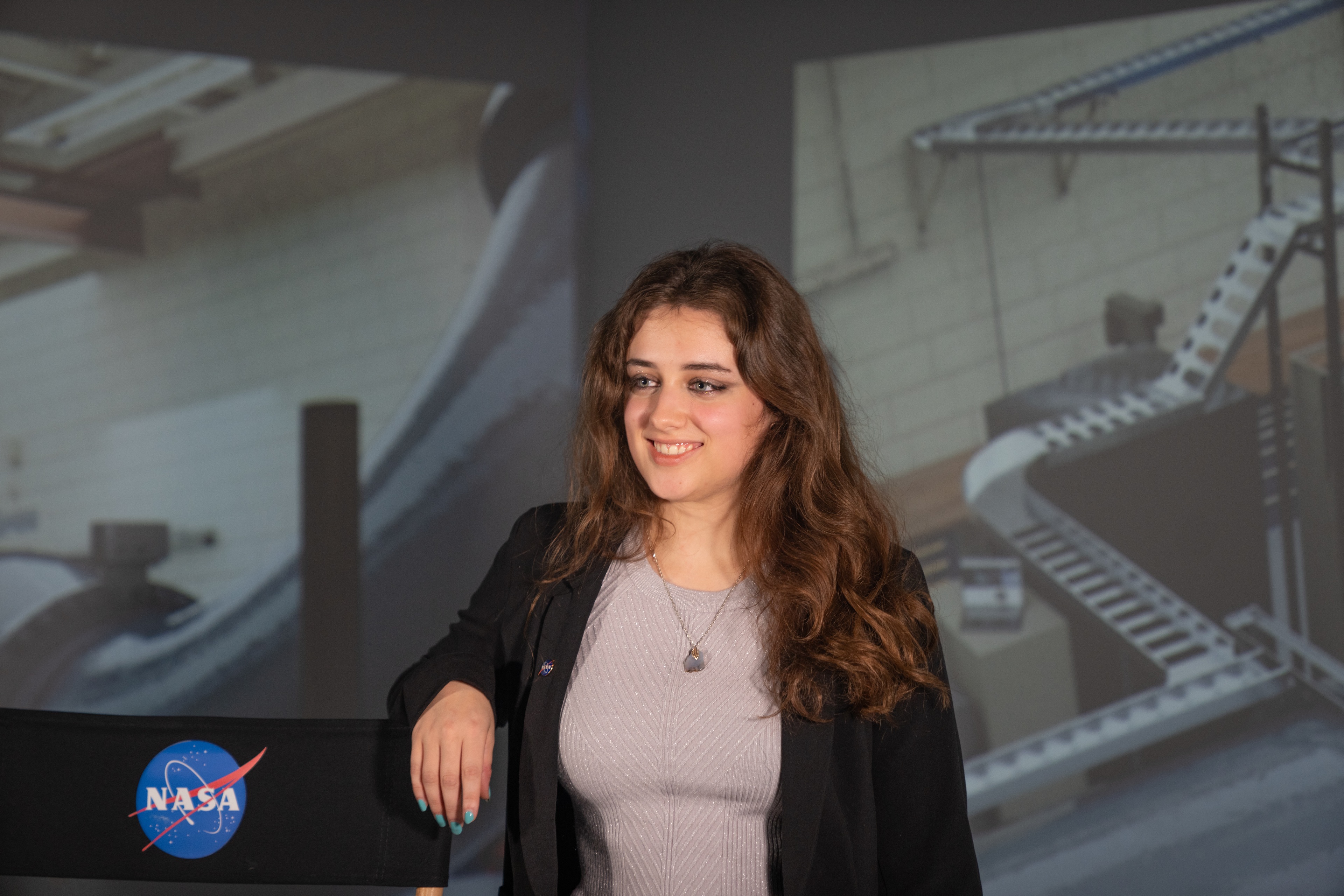 Olivia Francese stands in front of a model she completed.