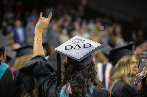 Graduation cap reads, "I hope I made you proud, dad!"