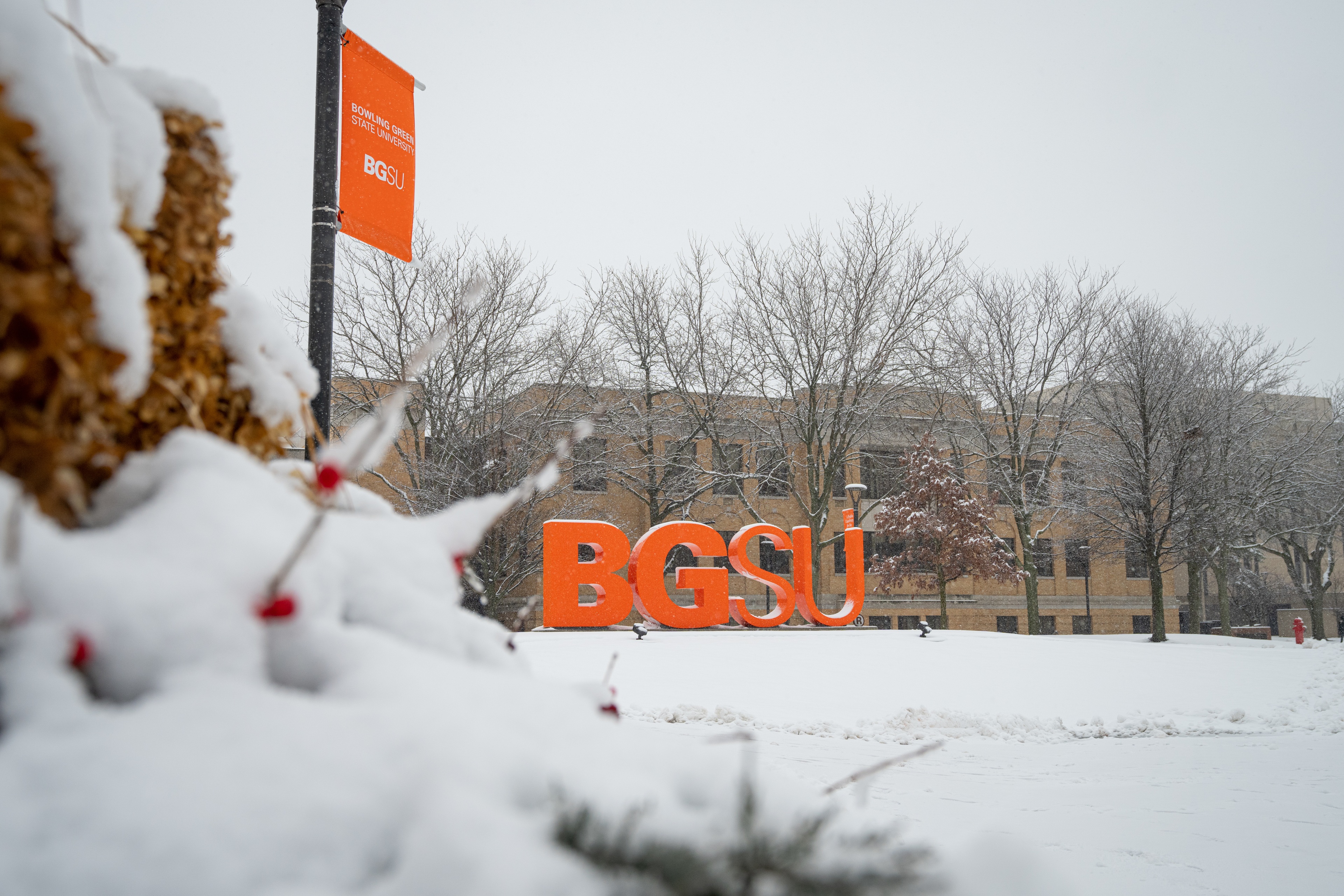 Block BGSU letters are seen on campus with snow on the ground