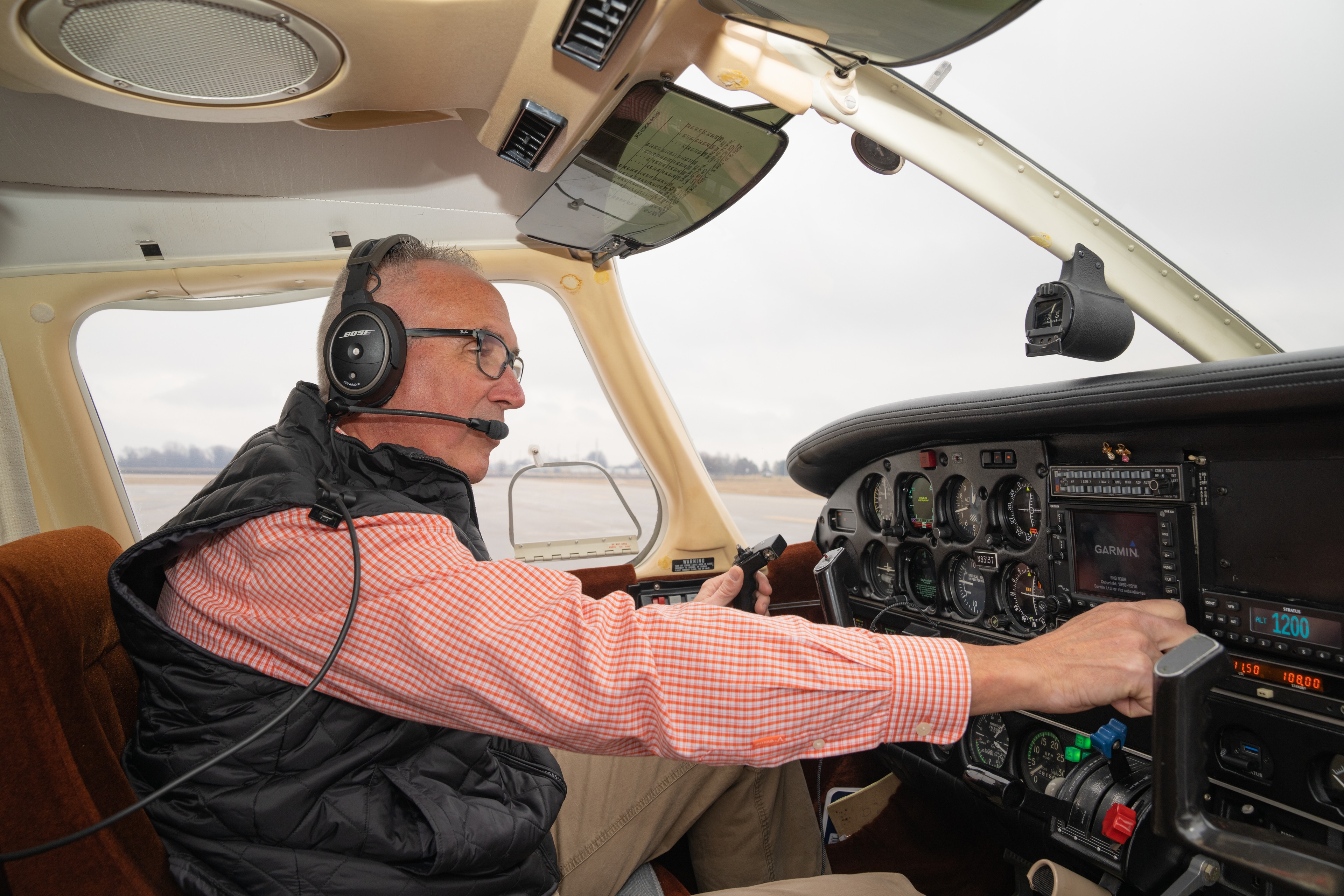 Man inside an airplane.