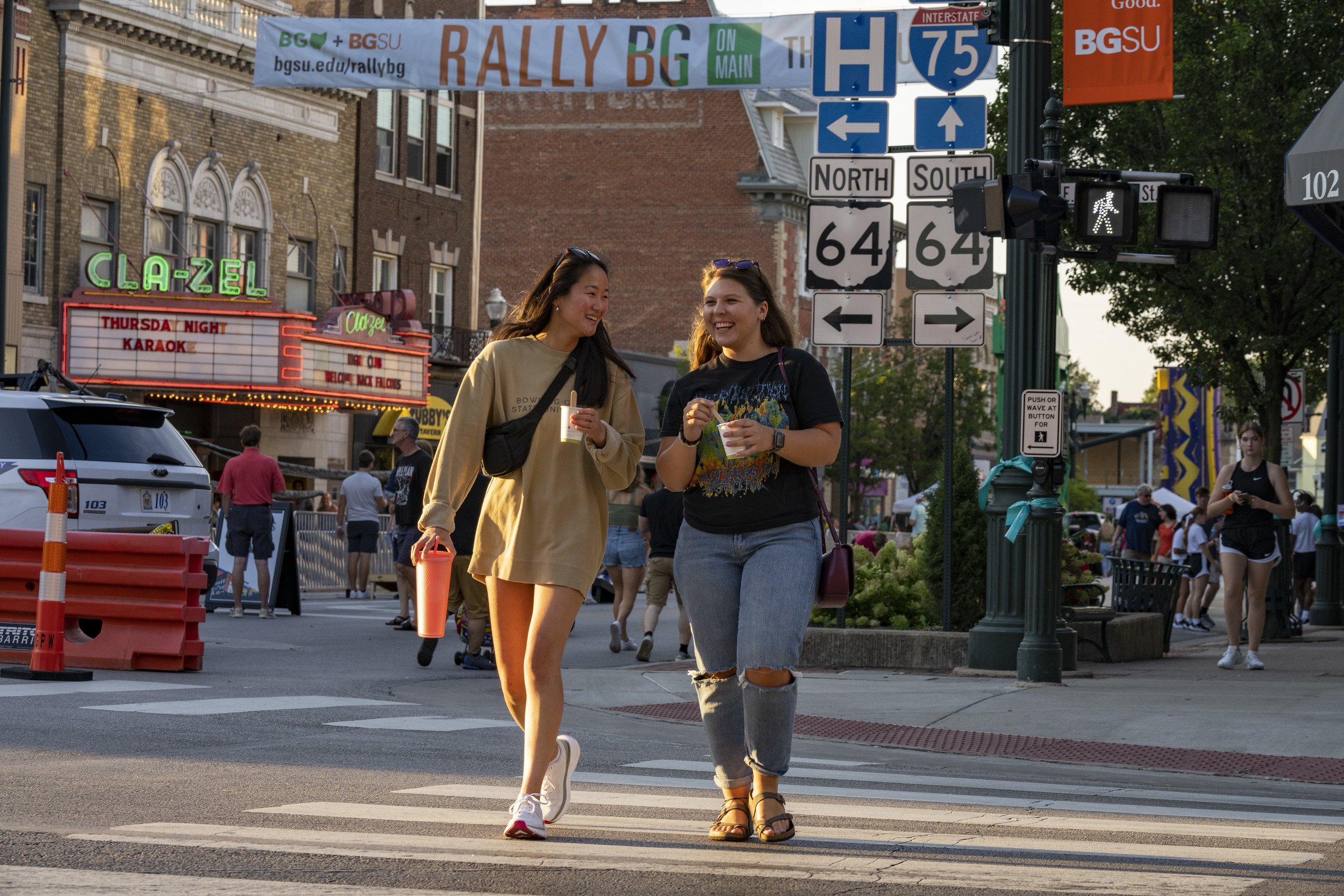 Two people walk together in downtown Bowling Green