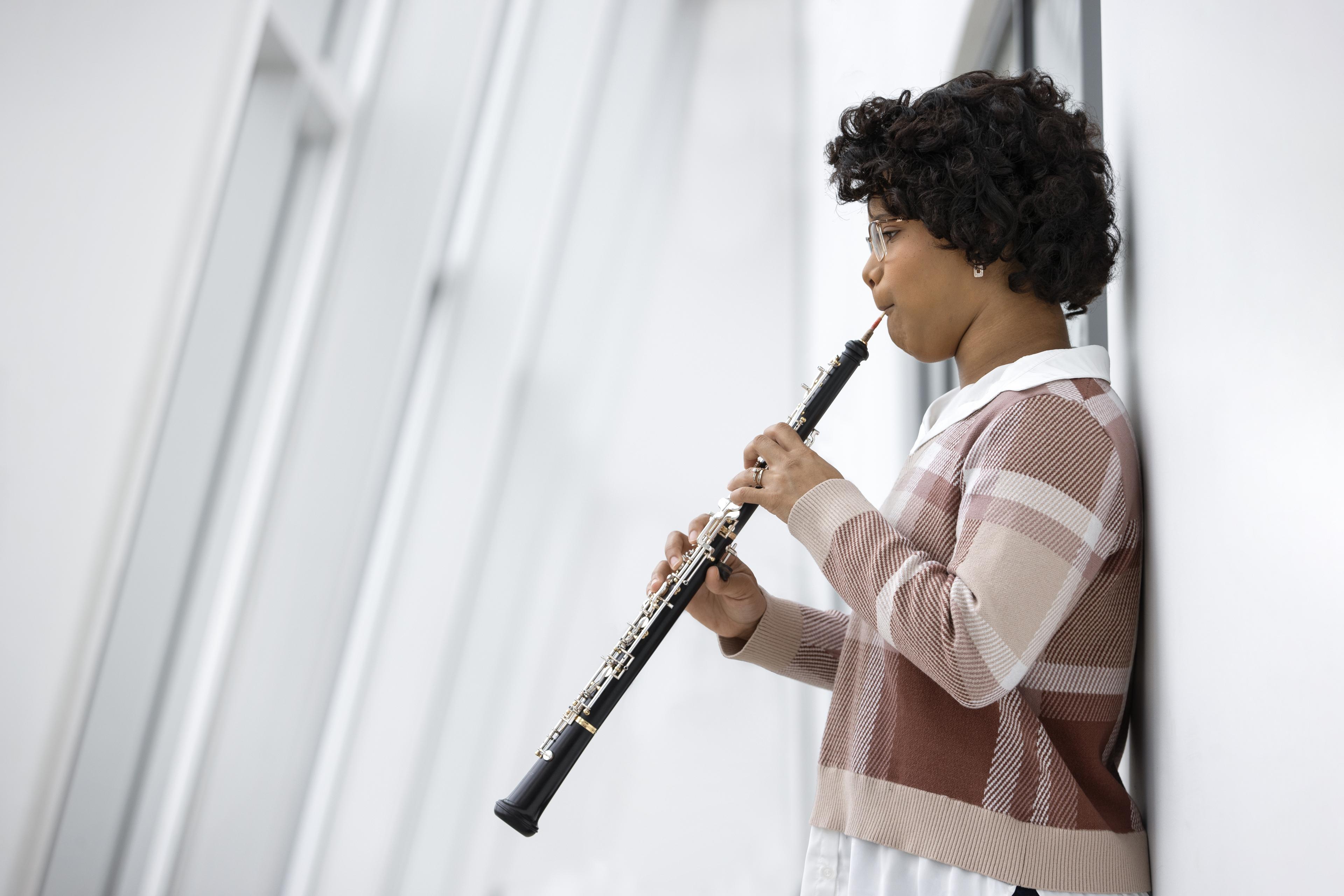 Martha Hudson plays the oboe.