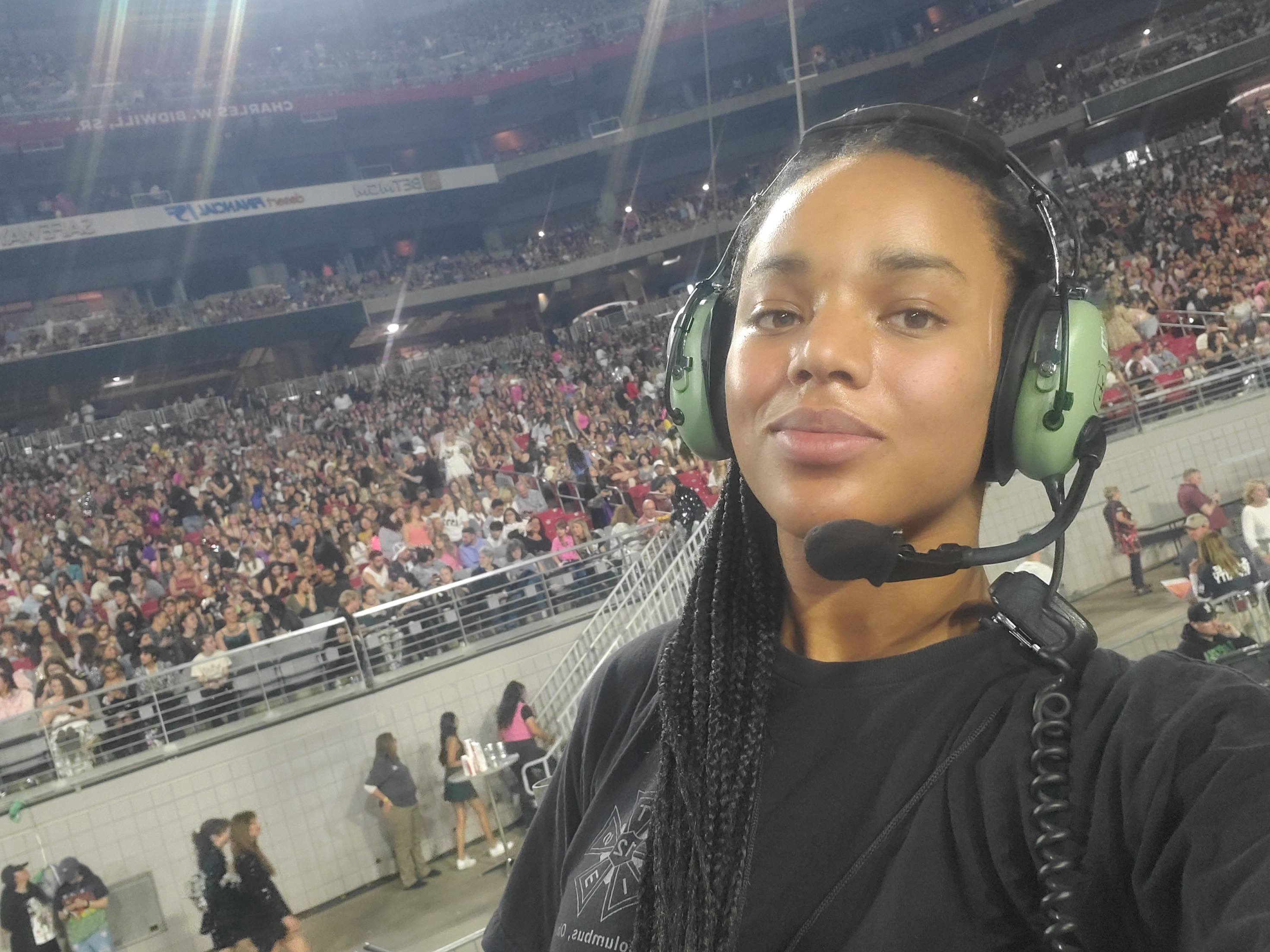 BGSU alumna Camryn Joyce wearing a headset for her role as camera operator