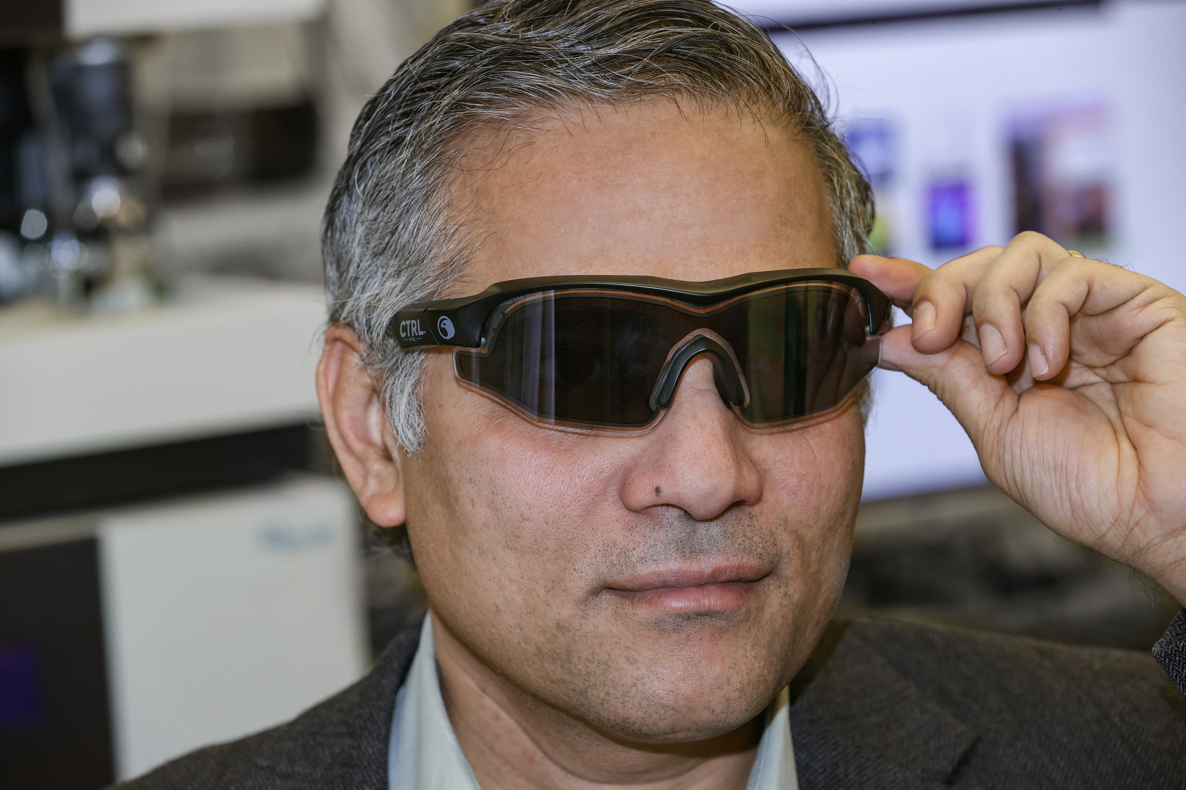  Dr. Jayaraman Sivaguru models electronically dimmable eyewear