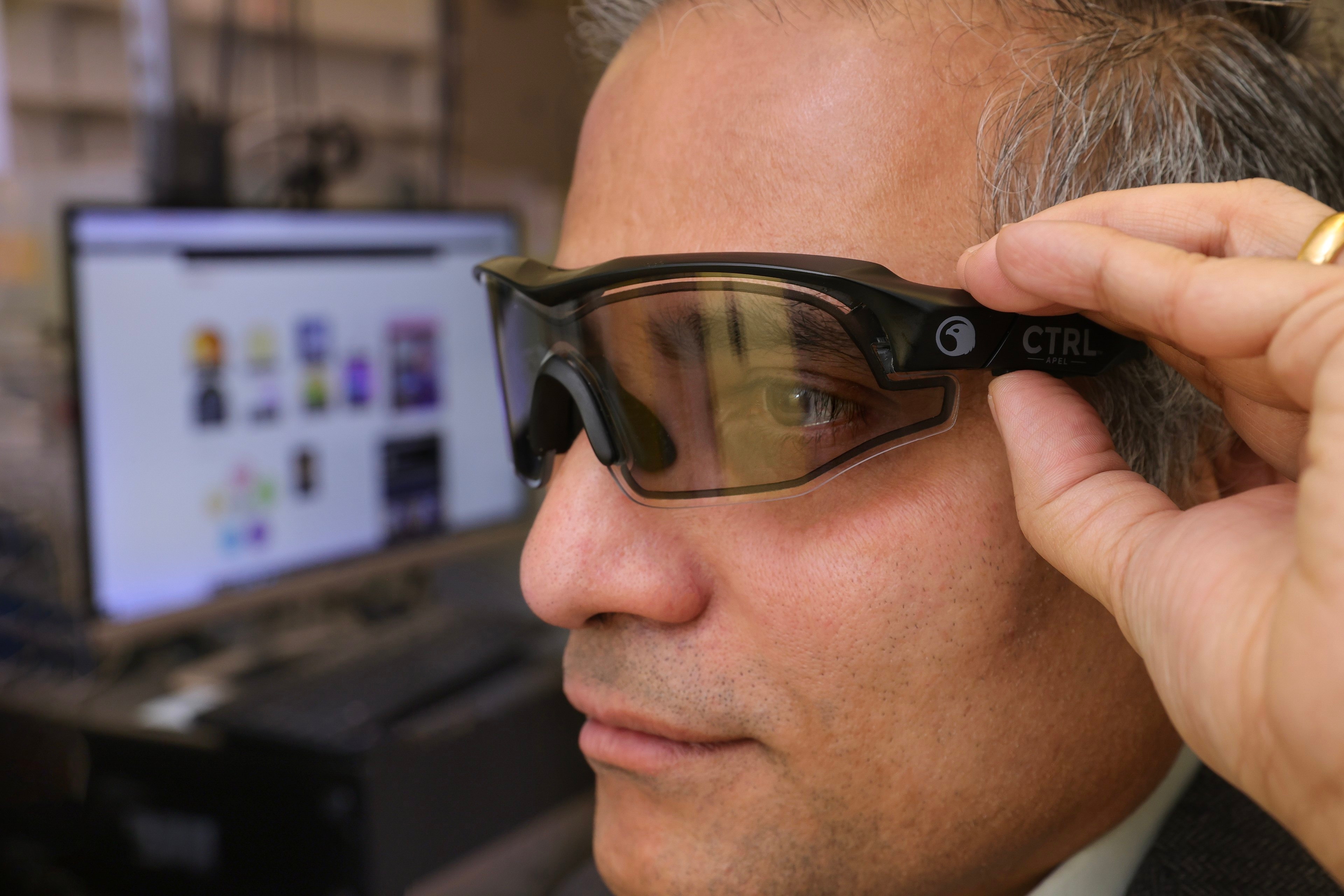 Dr. Jayaraman Sivaguru shows eyewear developed for U.S. Defense Department