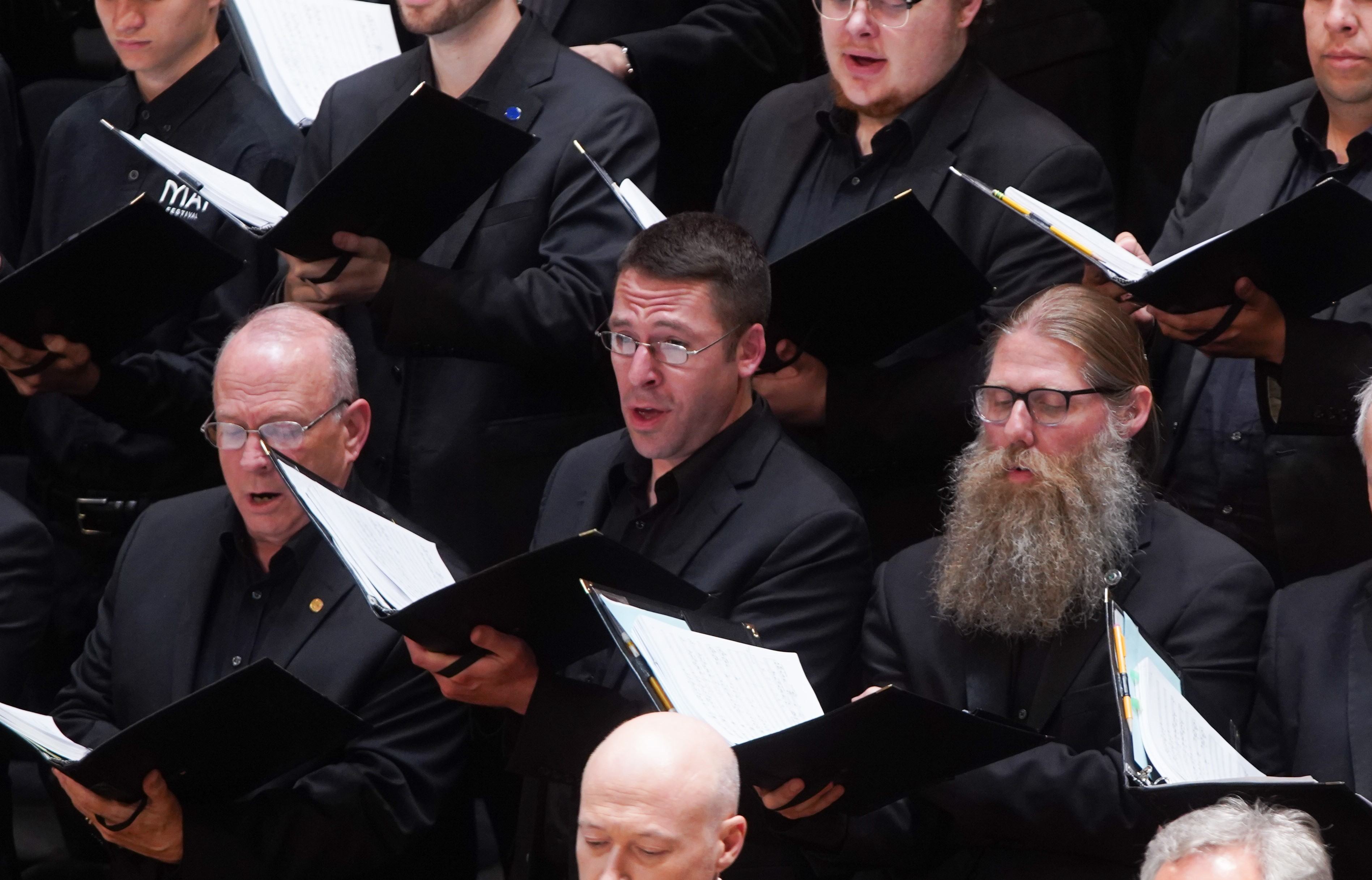 BGSU alumnus Christopher Kanney singing in a symphony performance