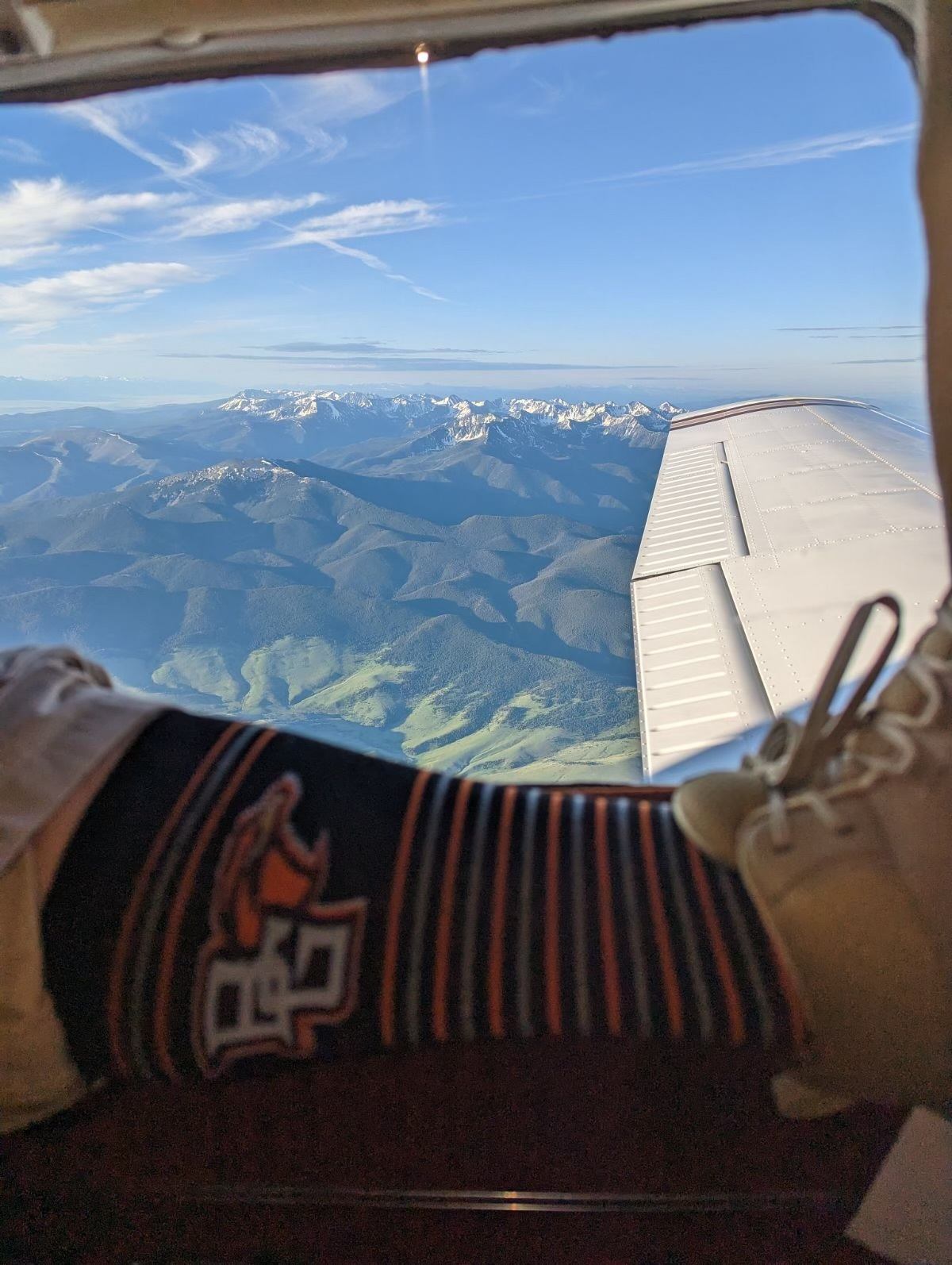 View of mountains out an airplane window. 