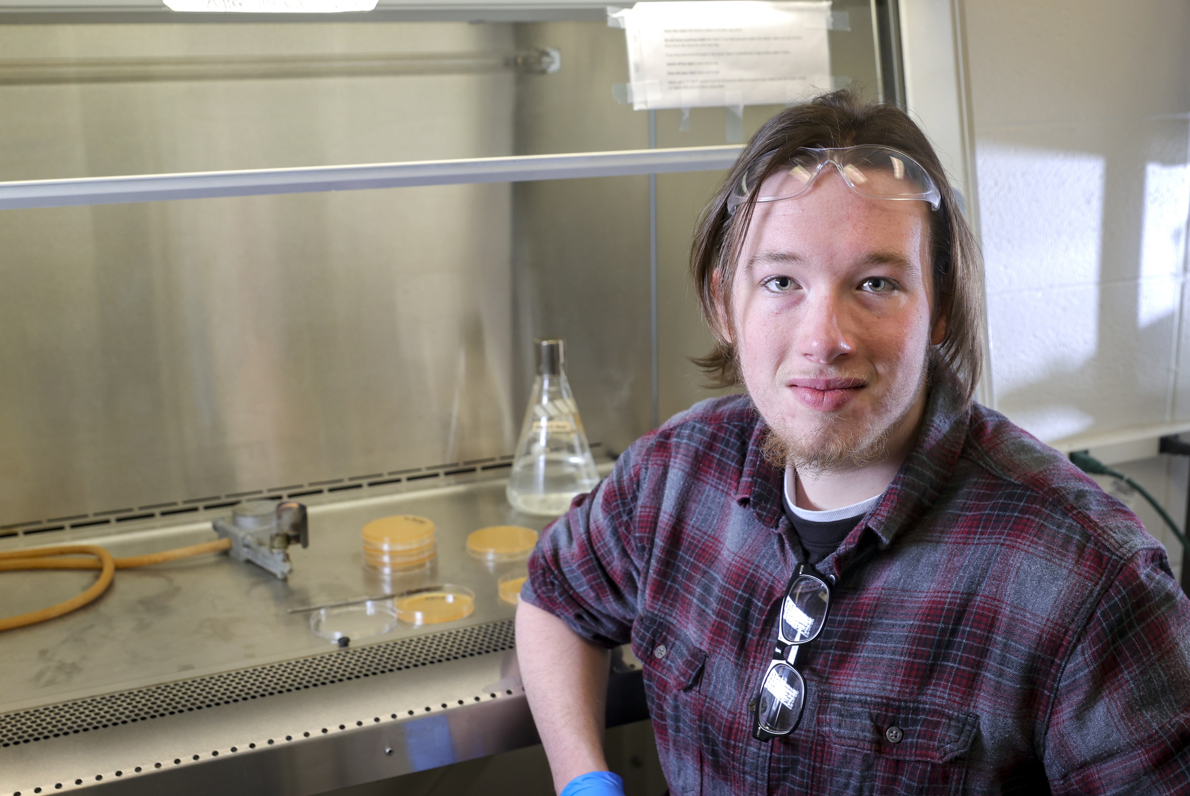 BGSU student posing in microbiology lab