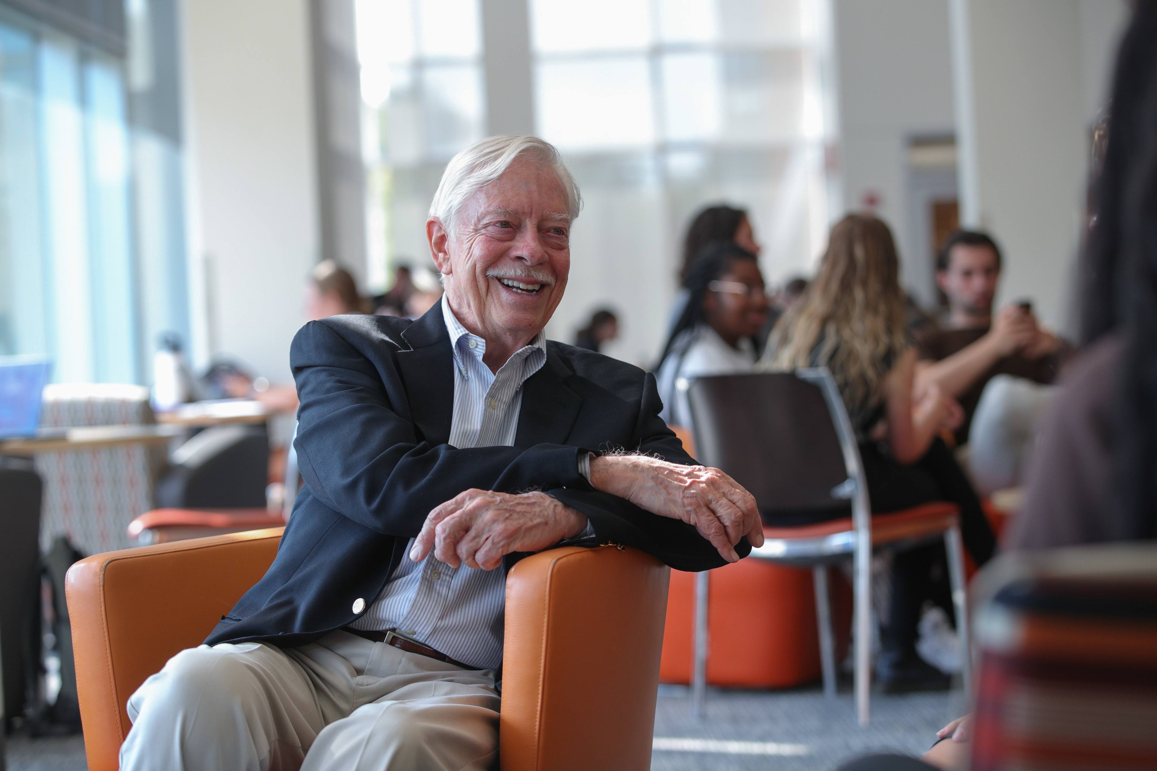 BGSU donor C. Raymond Marvin sits in a chair