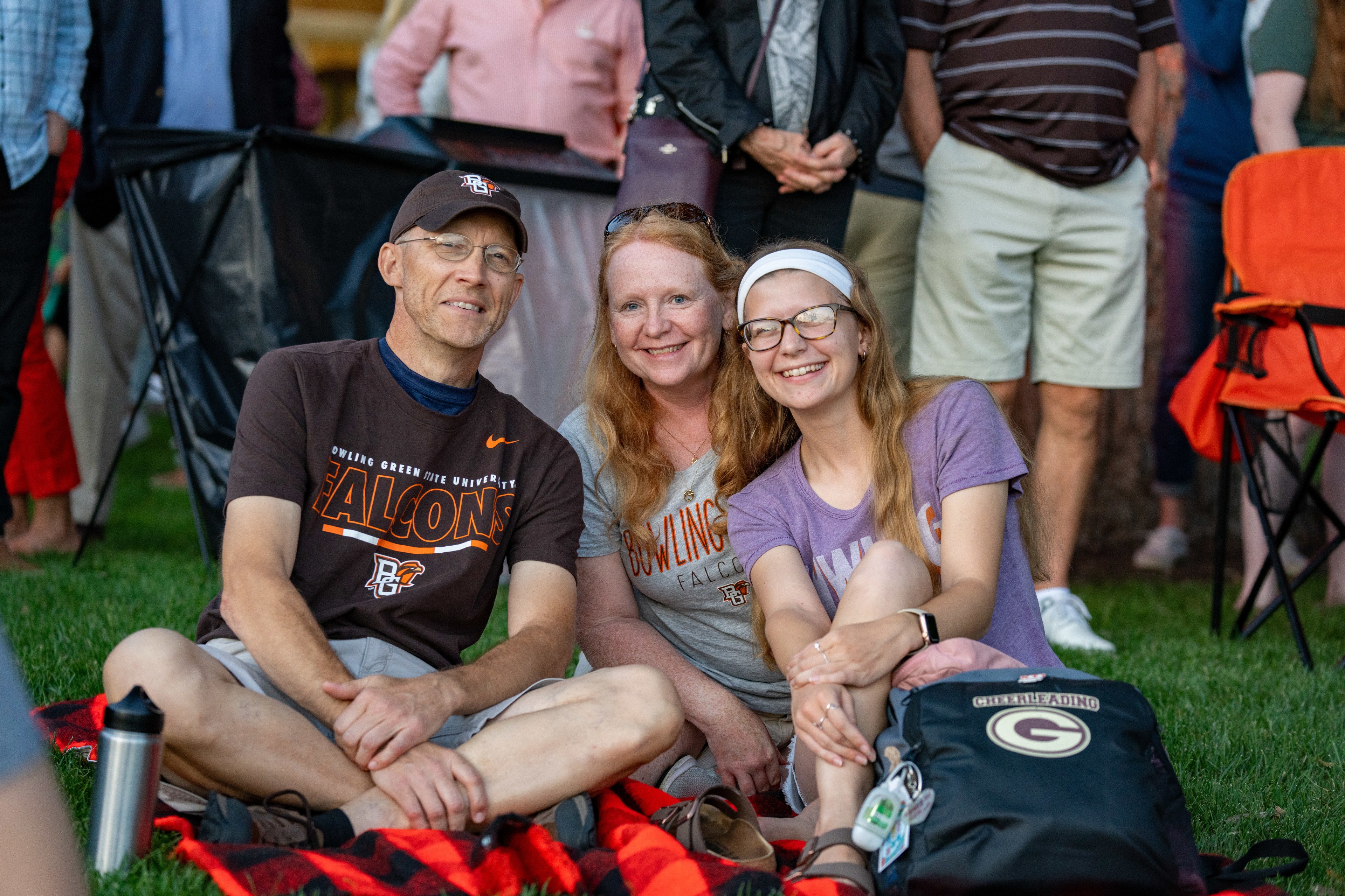 family watching circus thrill show