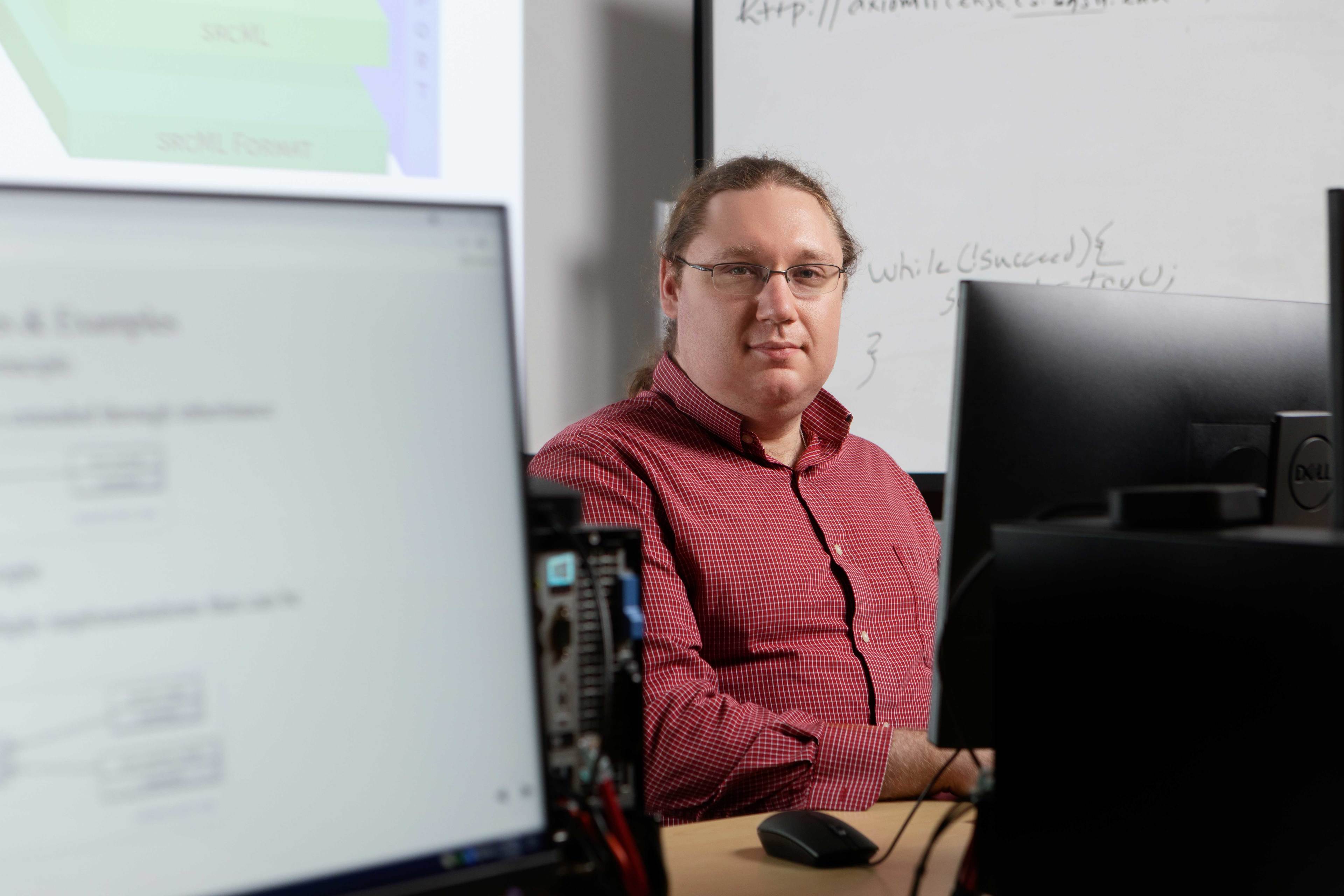 A man in a computer lab.