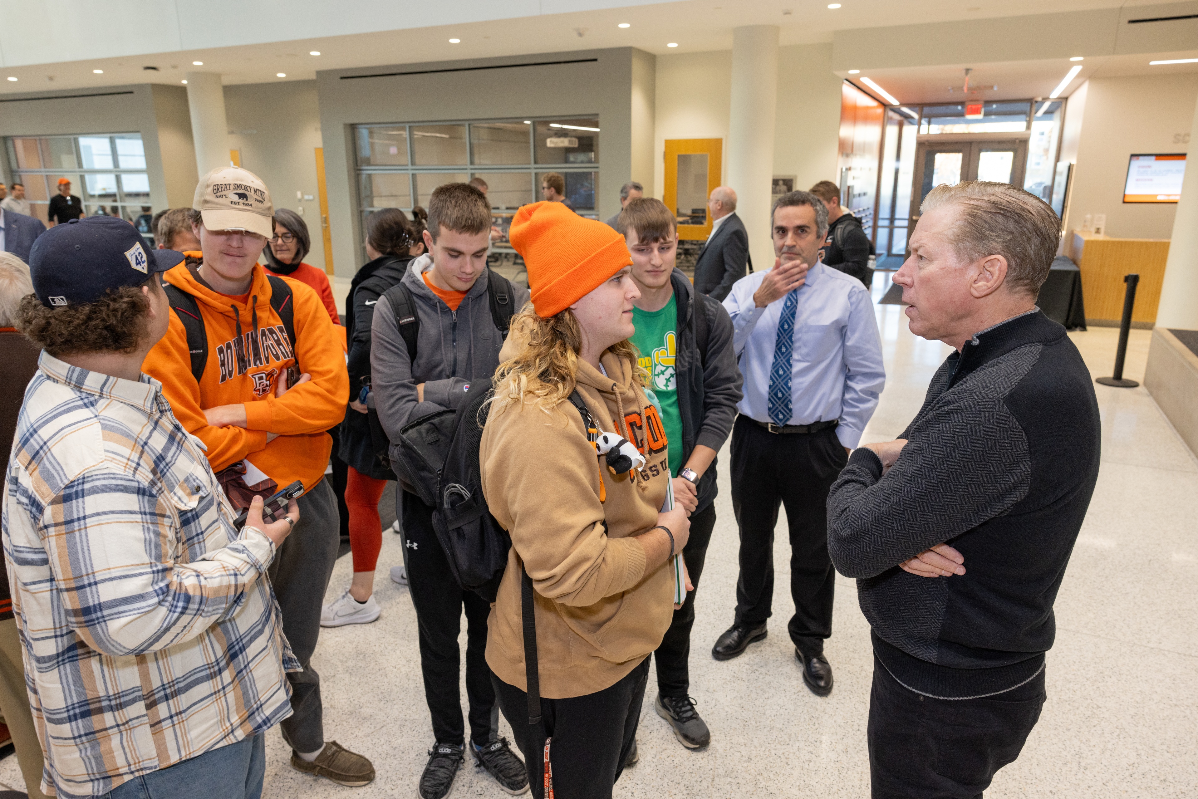 Former MLB pitcher Orel Hershiser speaks with several BGSU students