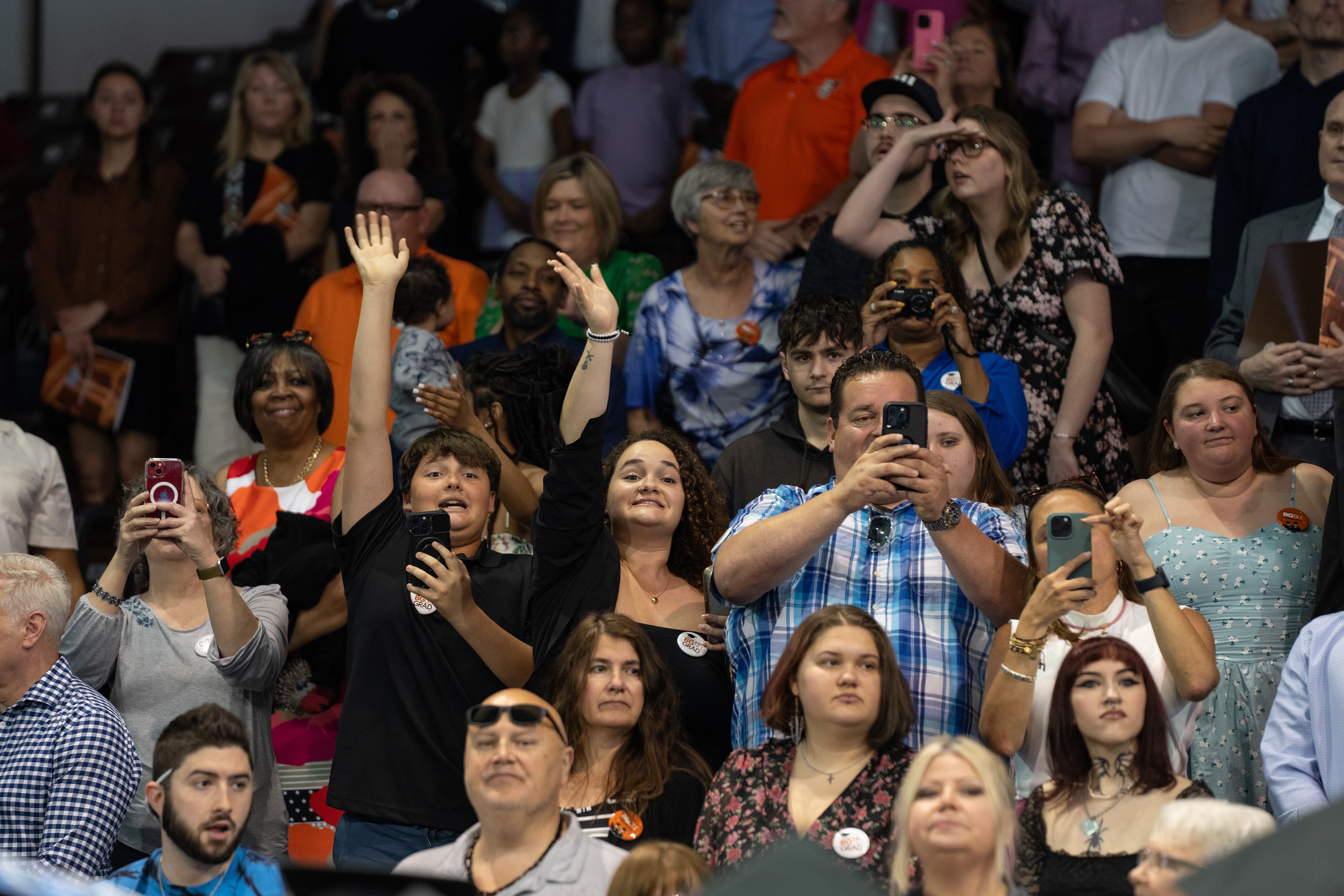 Family members and friends fill the arena stands at the Stroh Center 