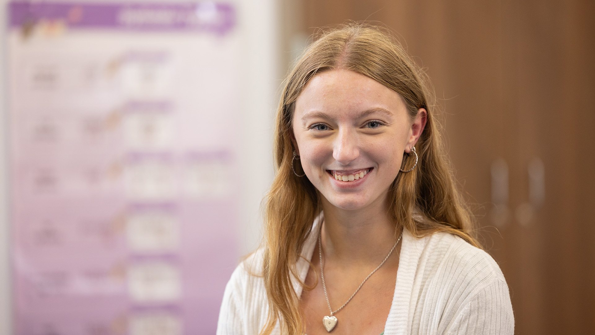 A person smiling at the camera.