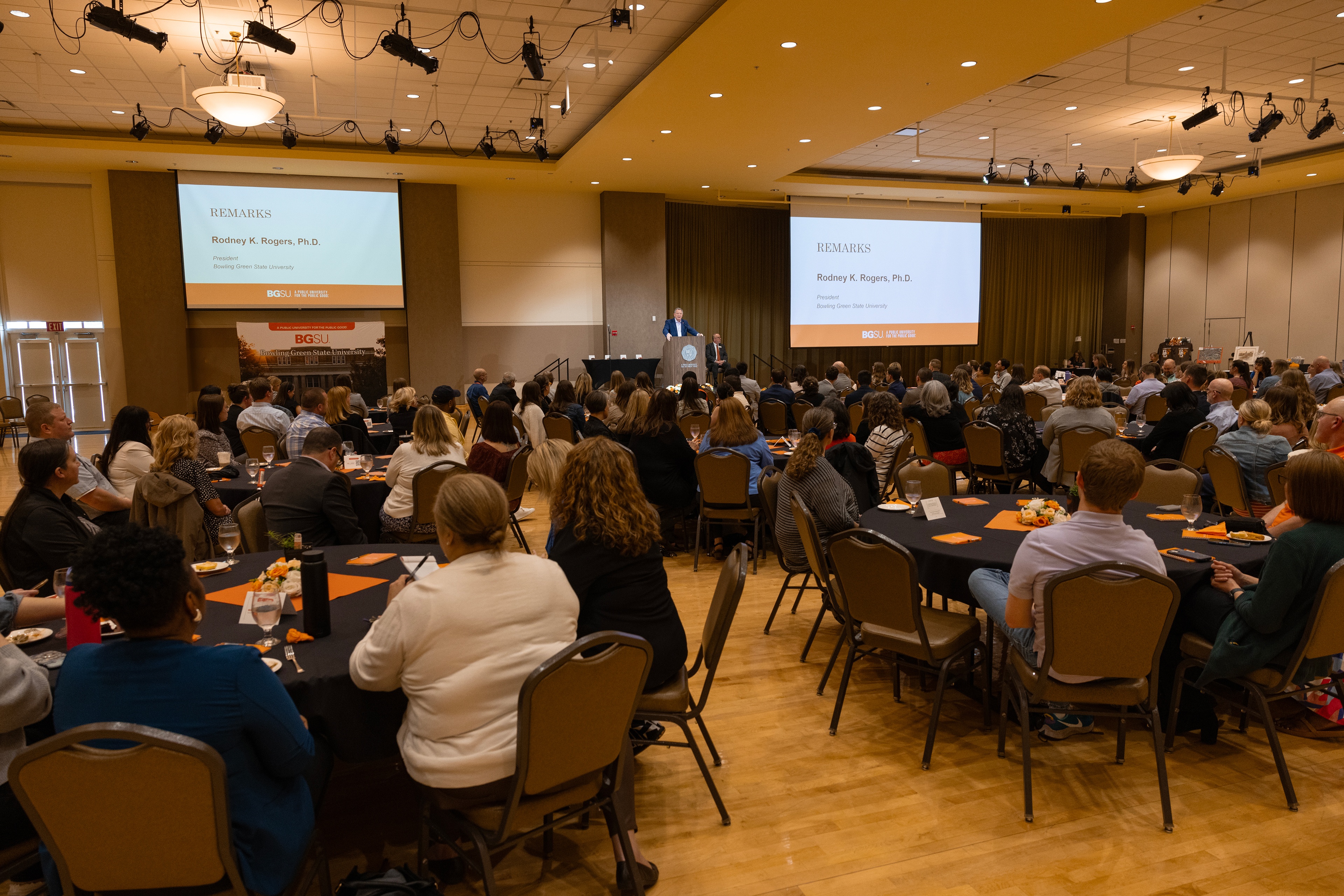 BGSU President Rodney K. Rogers addresses a ballroom full of people 