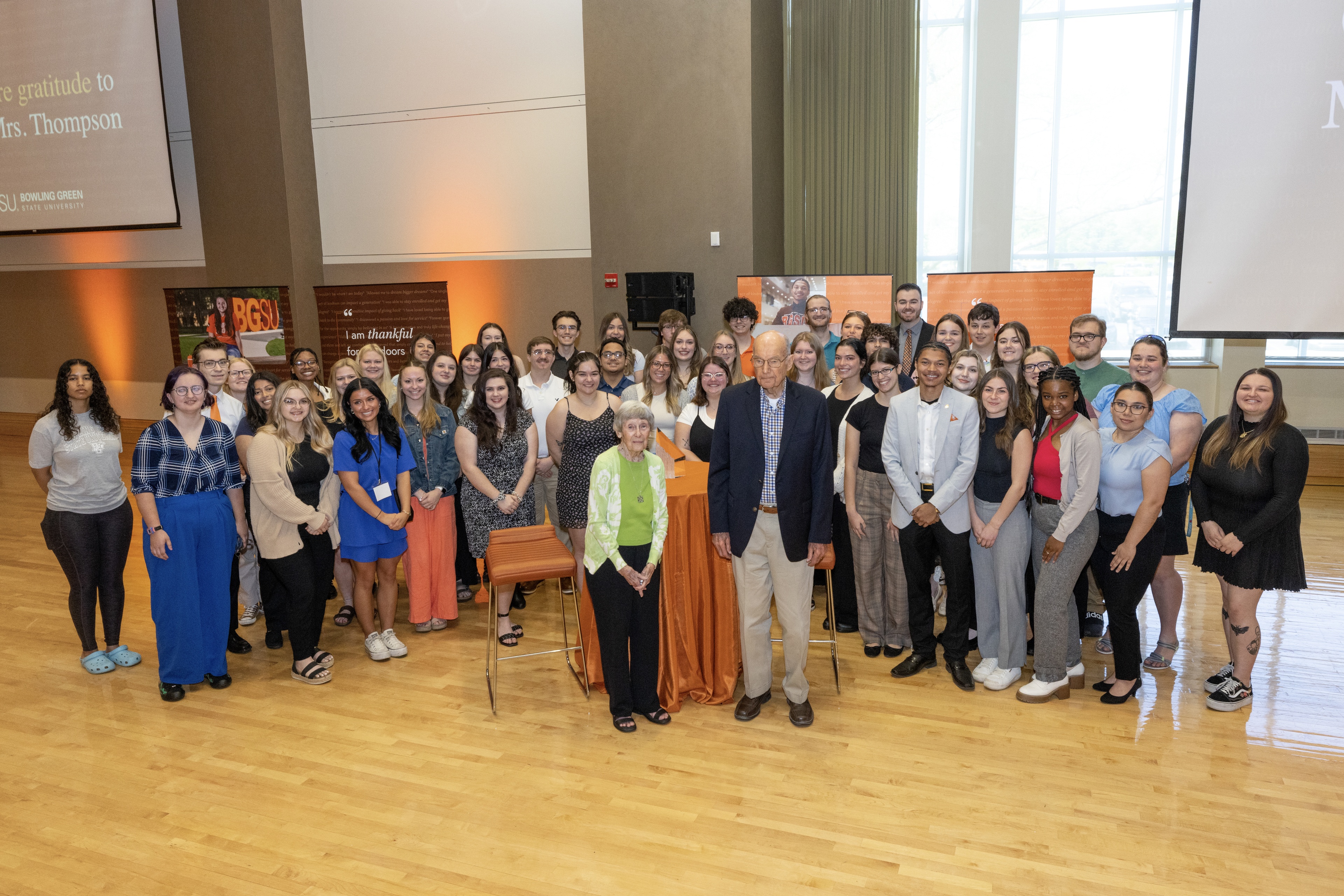 Thompson Family Scholars pose by the BGSU letters.  